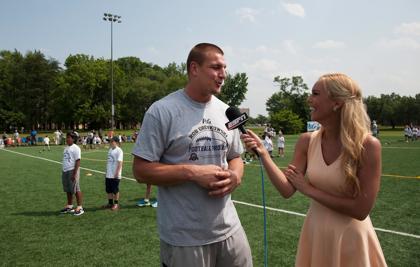 Rob Gronkowski, New England Patriots tight end, speaks with Britt McHenry, ESPN reporter, about his experience during a ProCamps event on Joint Base Andrews, Md., July 1, 2015. The camp promoted health and wellness to military children in the NCR. (U.S. Air Force photo/Airman 1st Class Philip Bryant)