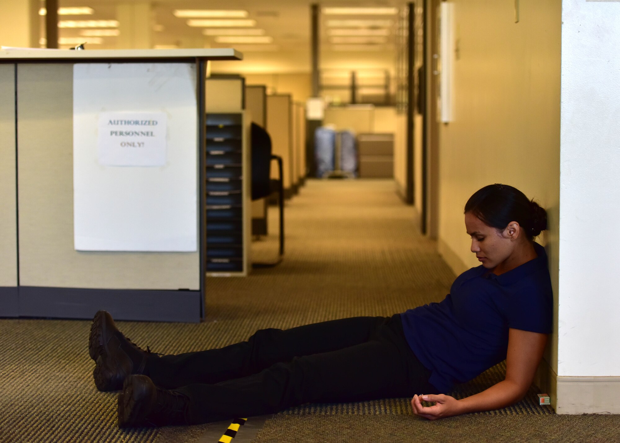 The Joint Base Pearl Harbor-Hickam security department recently partnered with the Honolulu Police Department during an active shooter training exercise, held July 1, 2015 off-base at the Personnel Support Detachment Building. The exercise tested the JBPHH security department and HPD's response capabilities during an active shooter scenario. (U.S. Air Force photo by Senior Airman Christopher Stoltz/Released)