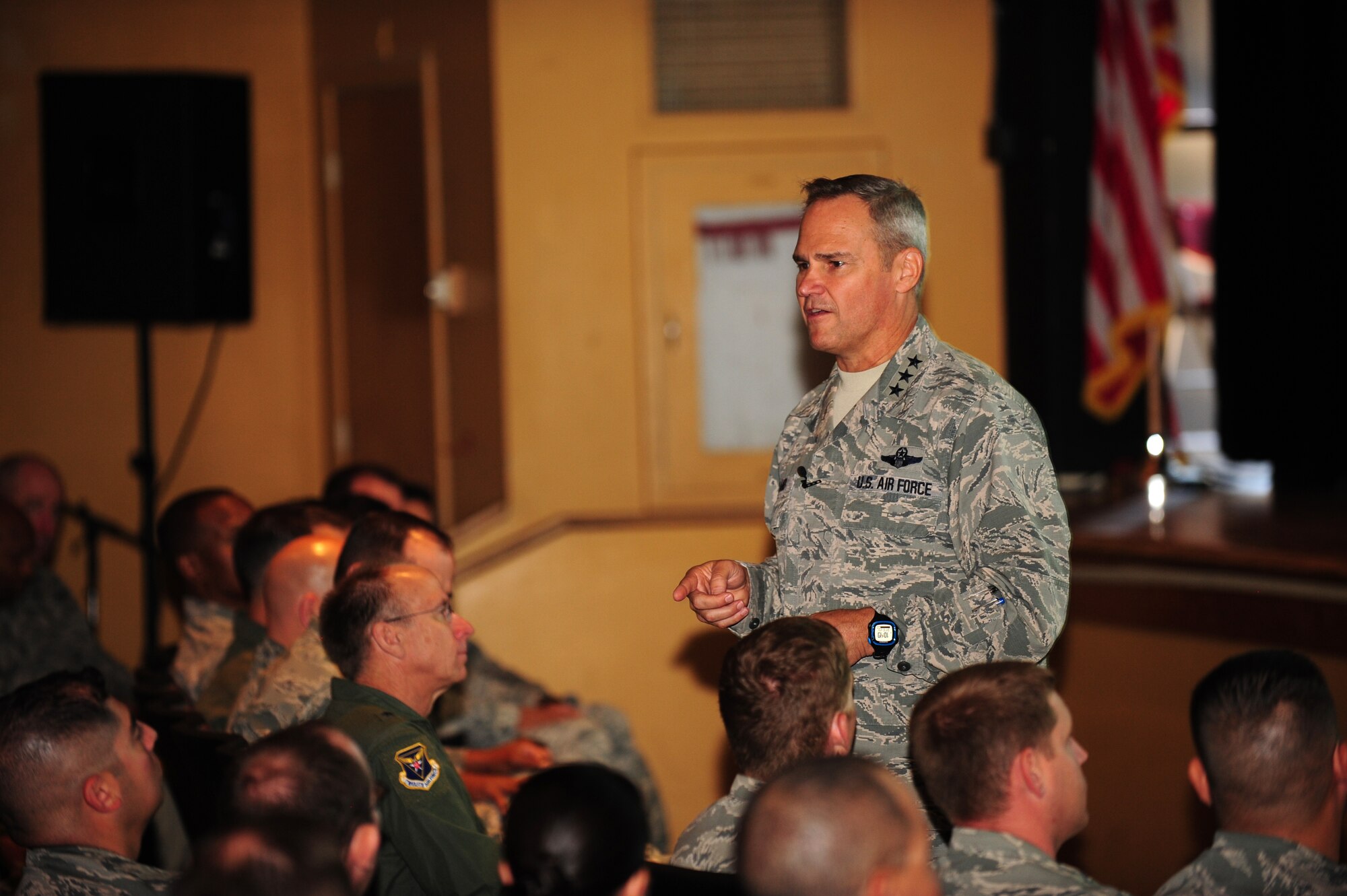 U.S. Air Force Lt. Gen. Chris Nowland, 12th Air Force (Air Forces Southern) commander, speaks to Airmen of the 355th Fighter Wing during an all-call at the base theater at Davis-Monthan Air Force Base, Ariz., July 2, 2015. During the all-call, Nowland told Airmen to know their left and right authorities, know their mission and execute it to the highest level of effectiveness. (U.S. Air Force photo by Airman 1st Class Chris Drzazgowski/Released)  