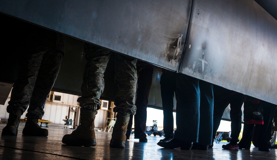 Local physicians from Trinity Hospital view the bomb bay of a B-52H Stratofortress during the 5th Medical Group open house at Minot Air Force Base, N.D., June 26, 2015. In addition to viewing the aircraft and its various deployable munitions, the group also visited the Uniform-01 missile trainer. (U.S. Air Force photo/Senior Airman Stephanie Morris)