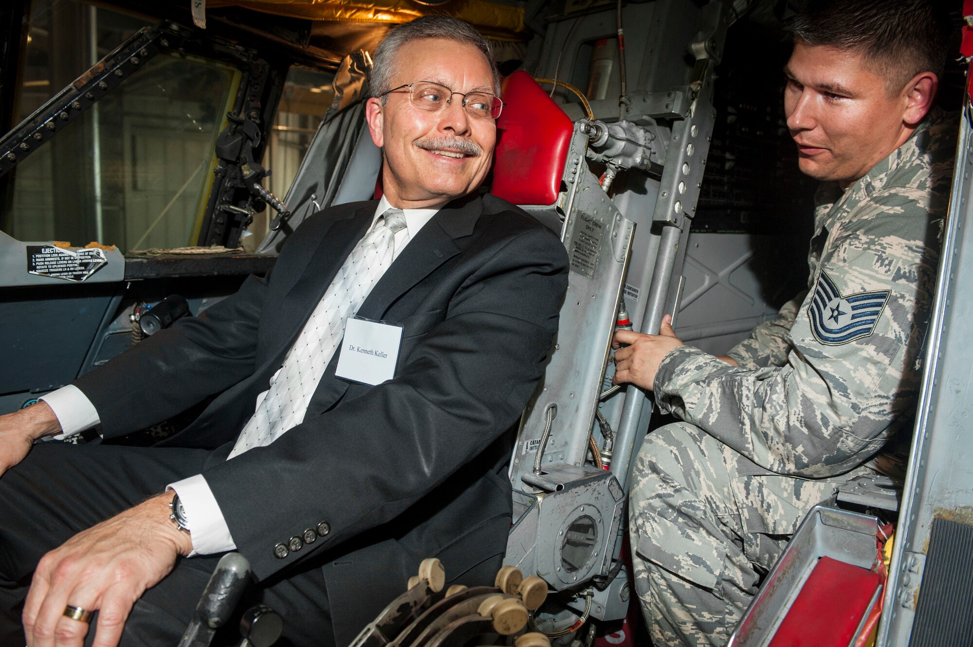 Dr. Kenneth Keller, Trinity Hospital radiologist, tours the cockpit of a B-52H Stratofortress during the 5th Medical Group open house at Minot Air Force Base, N.D., June 26, 2015. During the tour, Keller and his fellow medical professionals also viewed displays of the various ordinances that can be loaded onto the B-52H. (U.S. Air Force photo/Senior Airman Stephanie Morris)