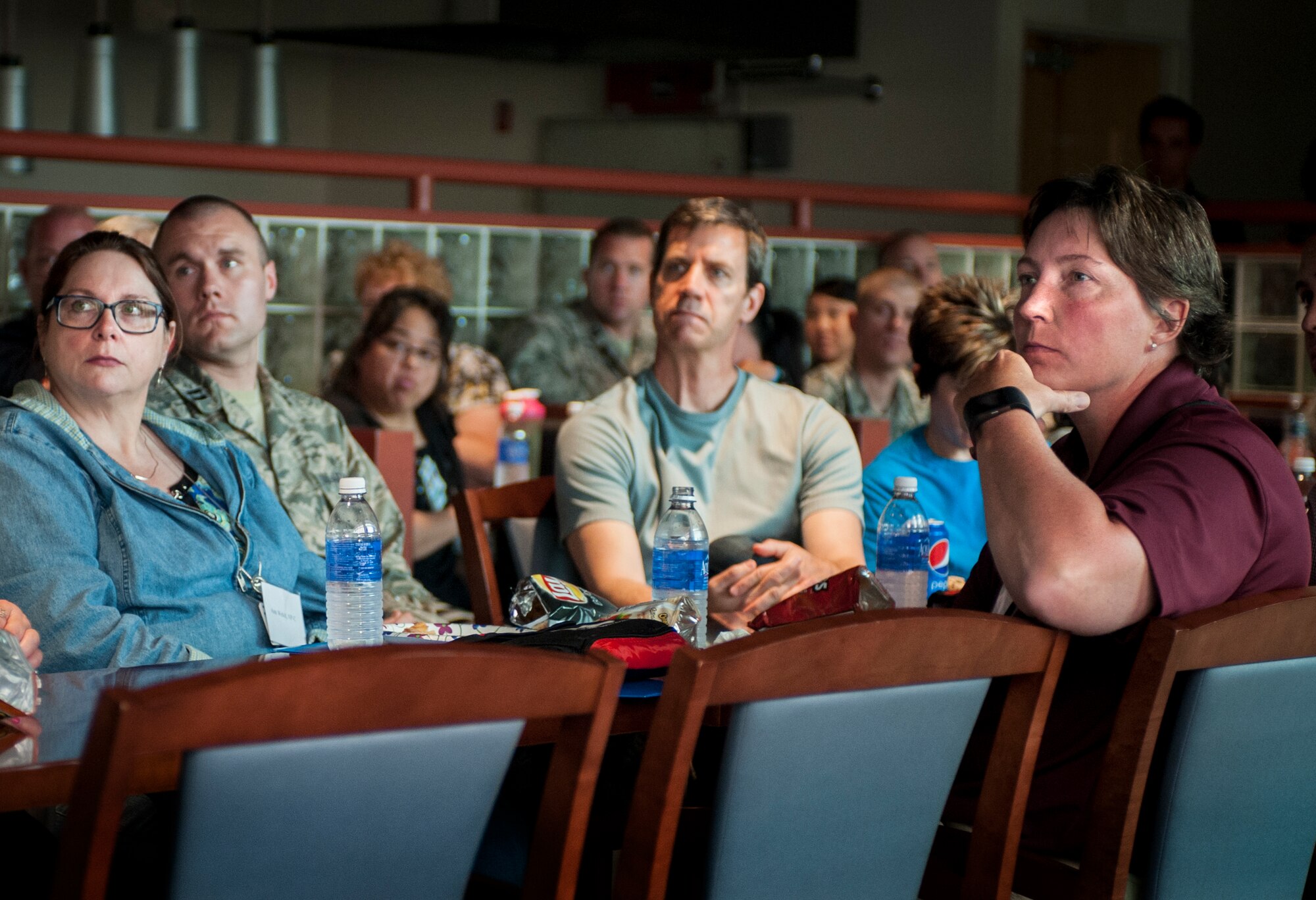Local physicians from Trinity Hospital listen to a presentation during the 5th Medical Group open house at Minot Air Force Base, N.D., June 26, 2015. The event was developed to strengthen existing professional relationships between the base and the local medical community. (U.S. Air Force photo/Senior Airman Stephanie Morris)