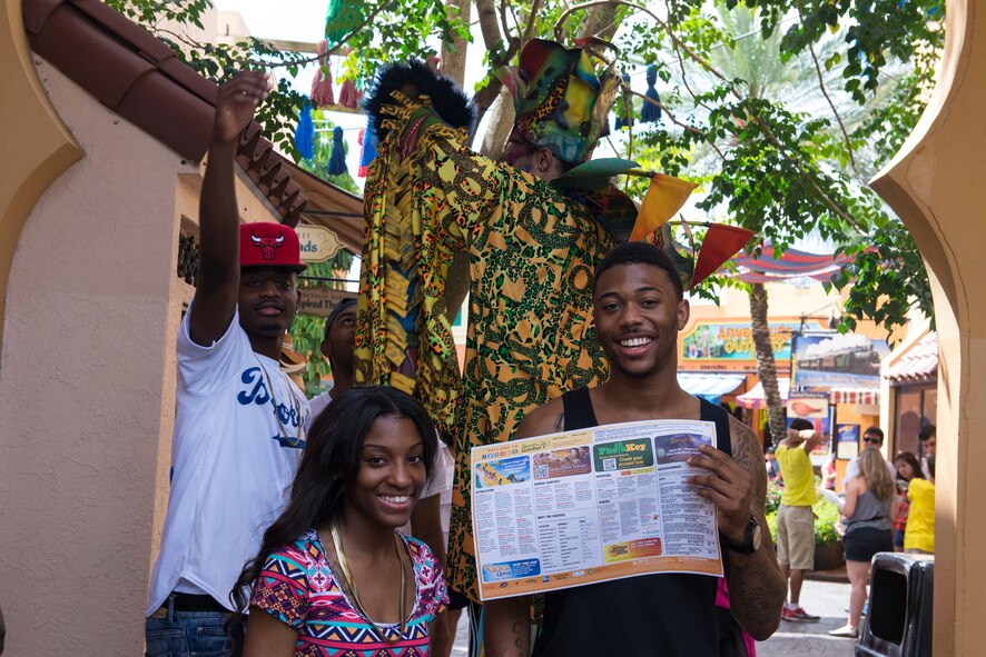 Team Moody members pose for a photo during a single Airmen resiliency trip June 27, 2015, at a theme park in Tampa, Fla. The 23d Wing and 93d Air Ground Operations Wing chapel facilitators sponsored the free trip to teach participants about improving communication skills, resolving conflicts and developing better problem-solving tactics. (U.S. Air Force photo by Airman Greg Nash/Released)