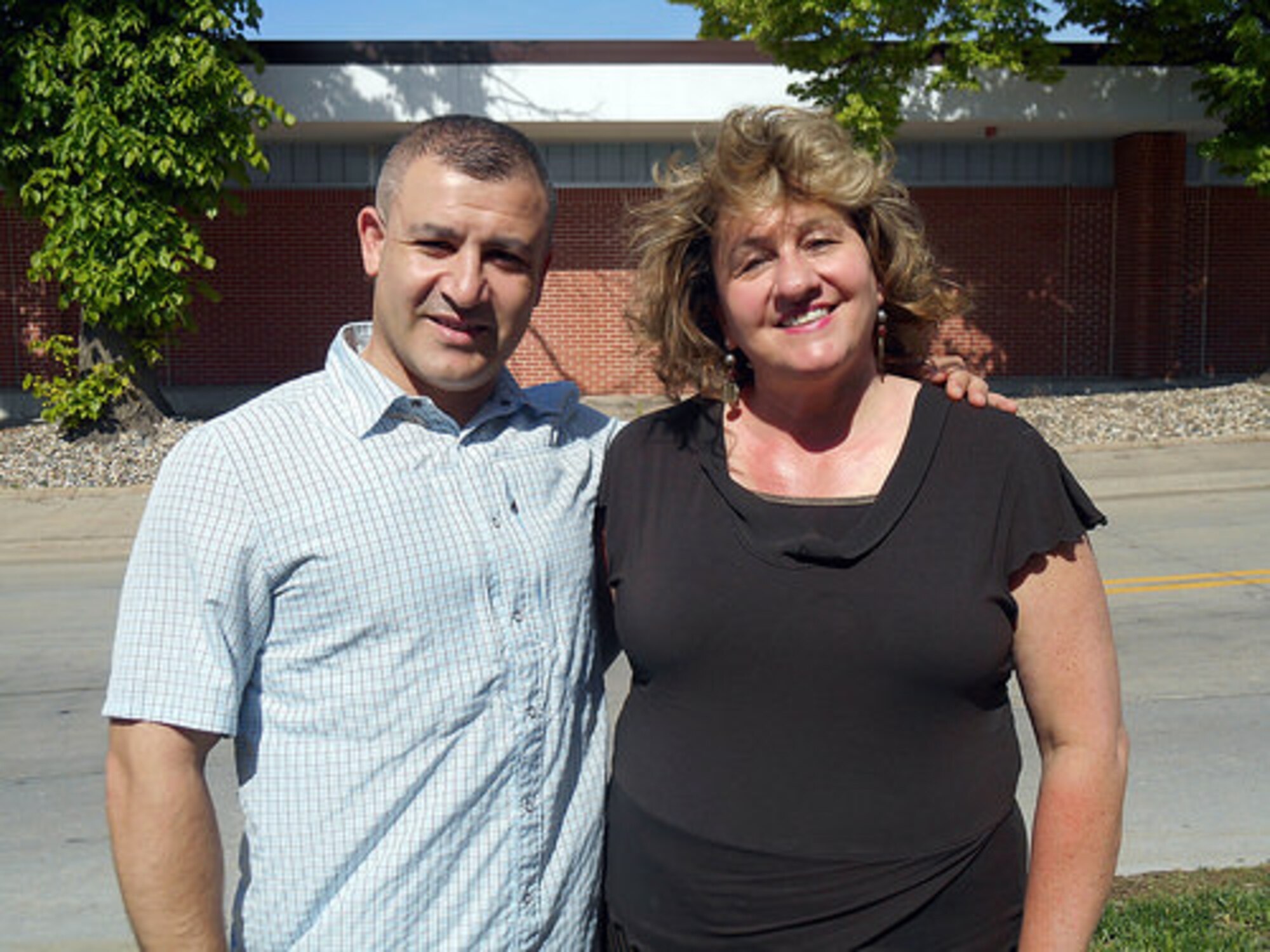 Hal Ergin (L), Exchange Human Resources learning manager, recently came to the aid of fellow Exchange employee Linda McQueen (R), the Exchange general manager’s office assistant  after she had a seizure and collapsed at Offutt Air Force Base, Nebraska. McQueen suffered a blood clot in her sinus cavity, a rare condition called sinus thrombosis which caused the seizure. (Courtesy Photo)
