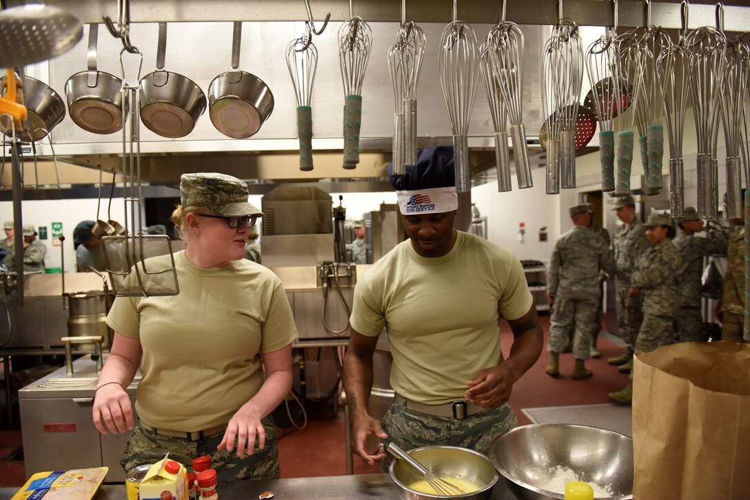 Airman 1st Class Jessica Rugg, left, and Senior Airman Christopher Malcolm, 341st Force Support Squadron nuclear facility chefs, won first place in the Warrior Chef Challenge June 30, 2015, at Malmstrom Air Force Base, Mont.  The Warrior Chef Challenge is an on-going tradition of the food services career field. (U.S. Air Force photo/Chris Willis)