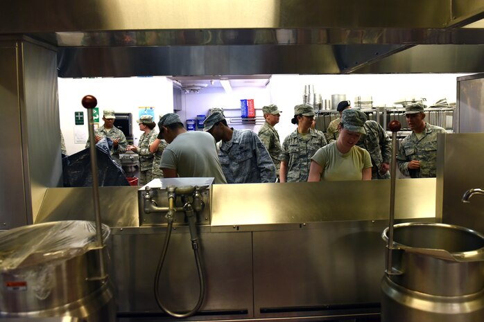 Teams gathered to showcase their culinary expertise and compete for the trophy in the Warrior Chef Challenge June 30, 2015, at Malmstrom Air Force Base, Mont. Three distinguished judges taste-tested and determined the best dish based on presentation, taste, and use of the secret ingredient, kiwi. (U.S. Air Force photo/Chris Willis)