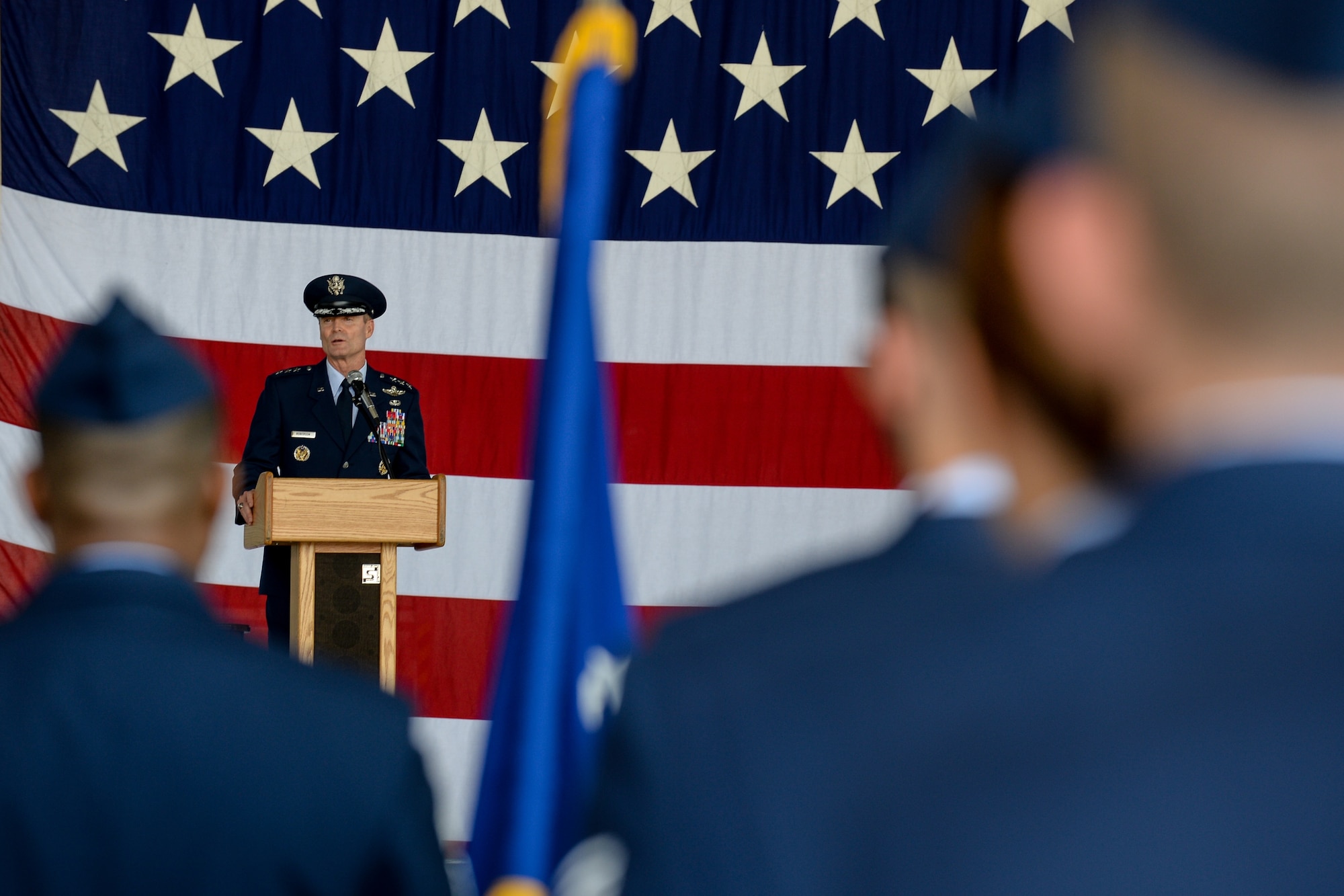 Lt. Gen. Darryl Roberson, Third Air Force and 17th Expeditionary Air Force outgoing commander gives his final speech during a change of command ceremony July 2, 2015, at Ramstein Air Base, Germany.  Before relinquishing command to Lt. Gen. Timothy M. Ray, he spoke of his experiences in his position as well as thanking commanders and Airmen for a job well done. (U.S. Air Force photo/Senior Airman Nicole Sikorski)