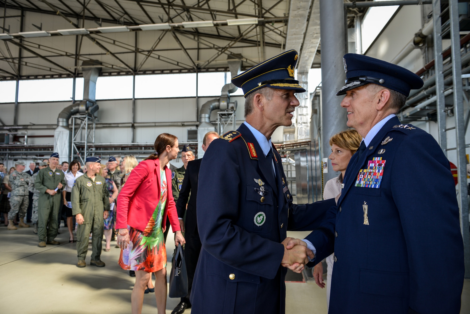 Lt. Gen. Timothy M. Ray, Third Air Force and 17th Expeditionary Air Force commander, greets wing commanders and German locals in a receiving line after a change of command ceremony July 2, 2015, at Ramstein Air Base, Germany.  At the ceremony, Ray accepted the guideon from Gen. Frank Gorenc, U.S. Air Forces in Europe and U.S. Air Forces Africa commander. (U.S. Air Force photo/Senior Airman Nicole Sikorski) 