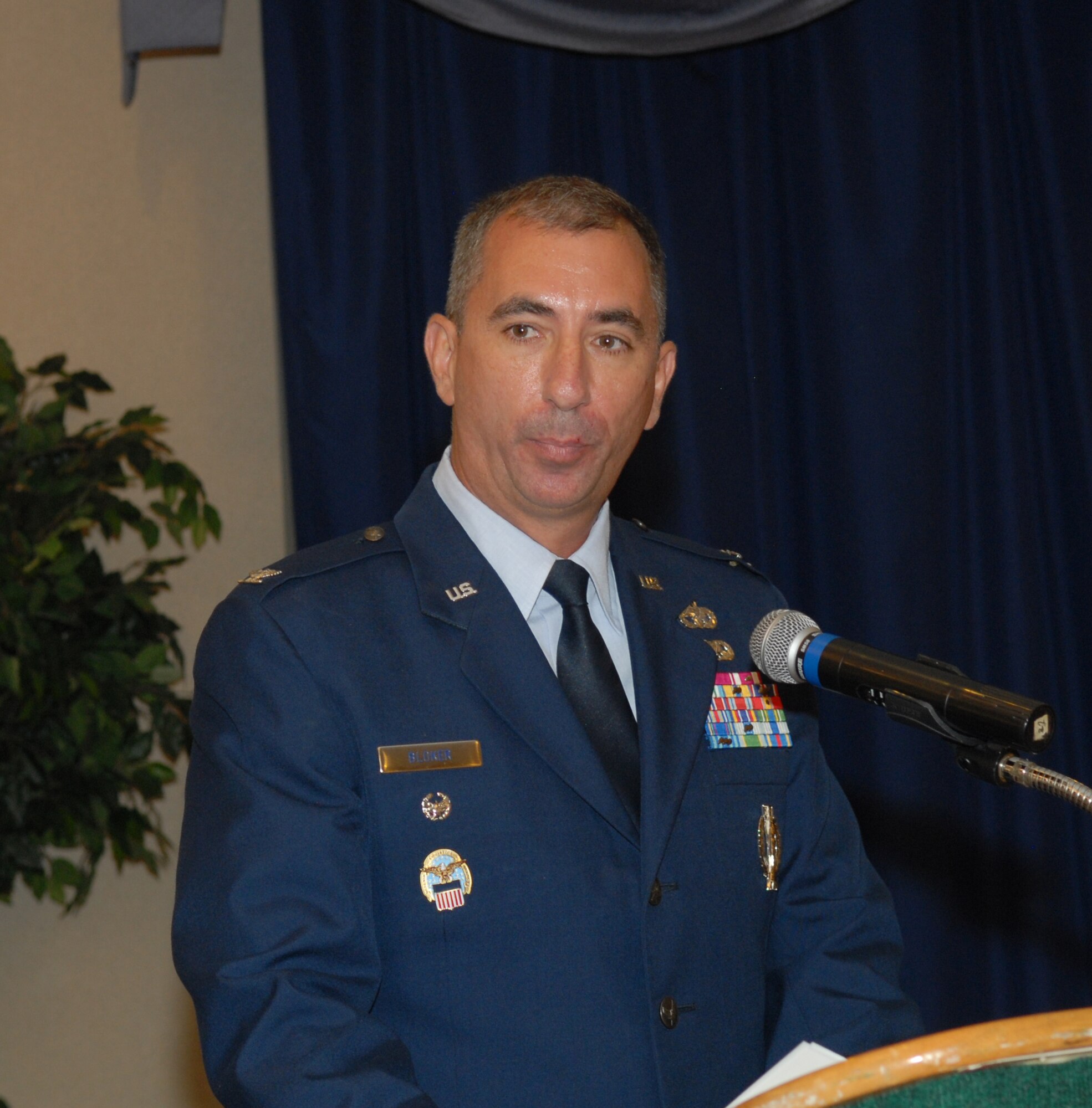 Col. Rod Bloker, Defense Logistics Agency Aviation Warner Robins commander, speaks after assuming command. (U.S. Air Force photo by Misuzu Allen)