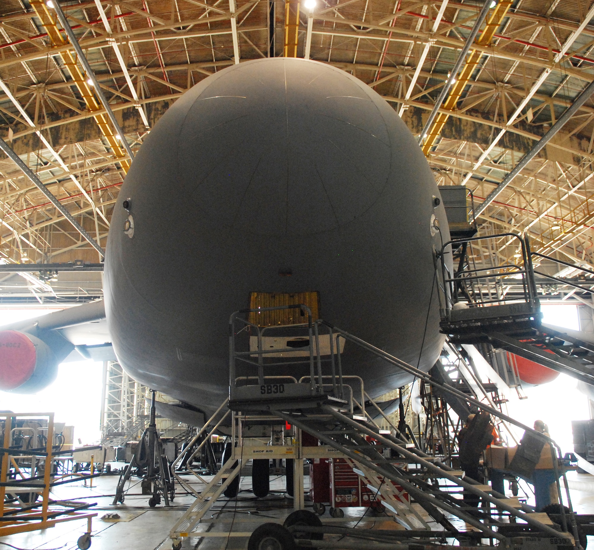 The first C-5C model to undergo Large Aircraft Infrared Countermeasures systems modifications sits in a hangar on the Robins flight line. (U.S. Air Force photo by Misuzu Allen)