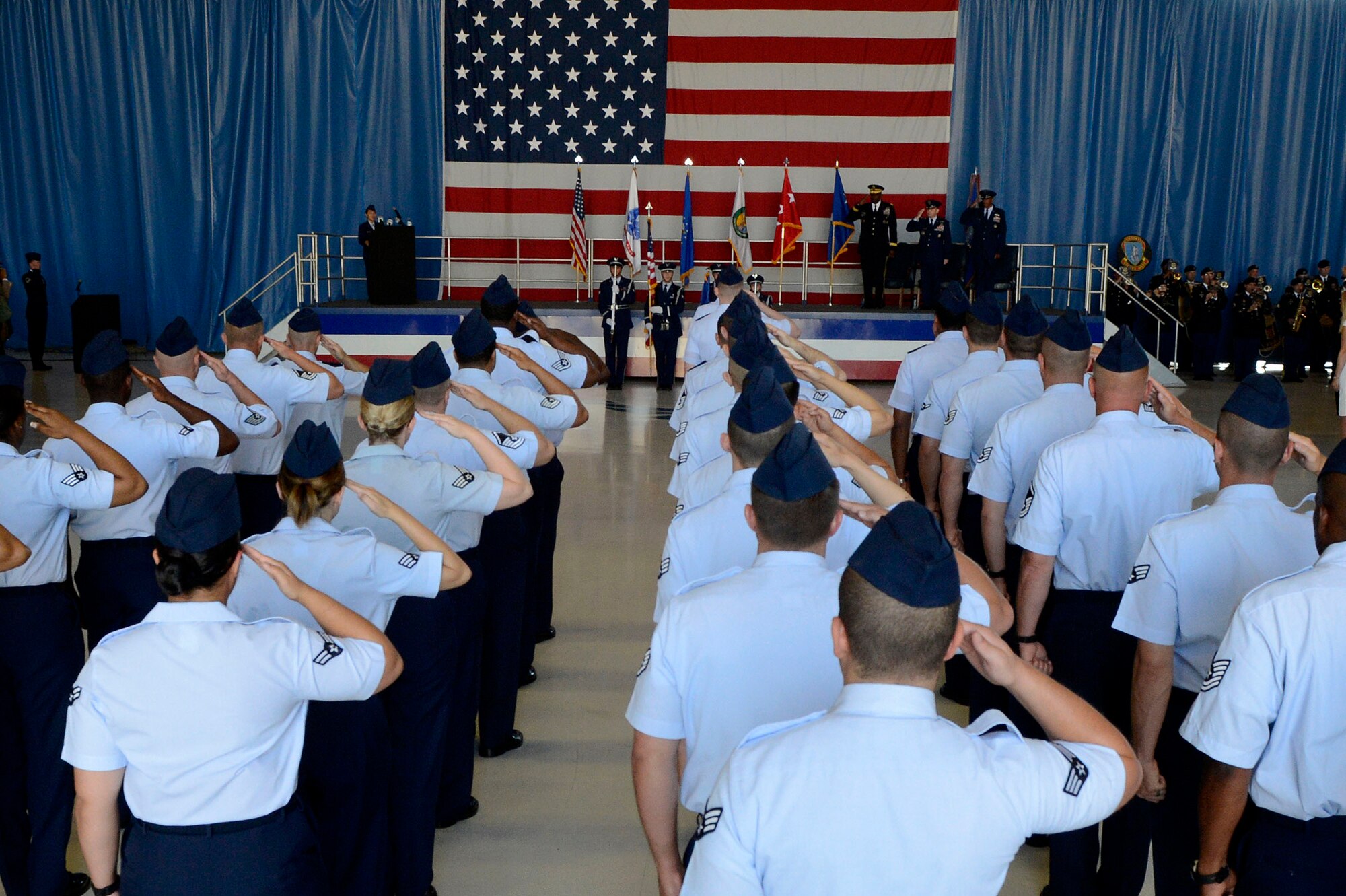 U.S. Air Forces Central Command Airmen render salutes during the USAFCENT change of command ceremony at Shaw Air Force Base, S.C., June 29, 2015.  More than 300 service members and community leaders attended the ceremony to welcome the incoming commander, Lt. Gen. Charles Q. Brown Jr. (U.S. Air Force photo by Senior Airman Jensen Stidham/Released) 