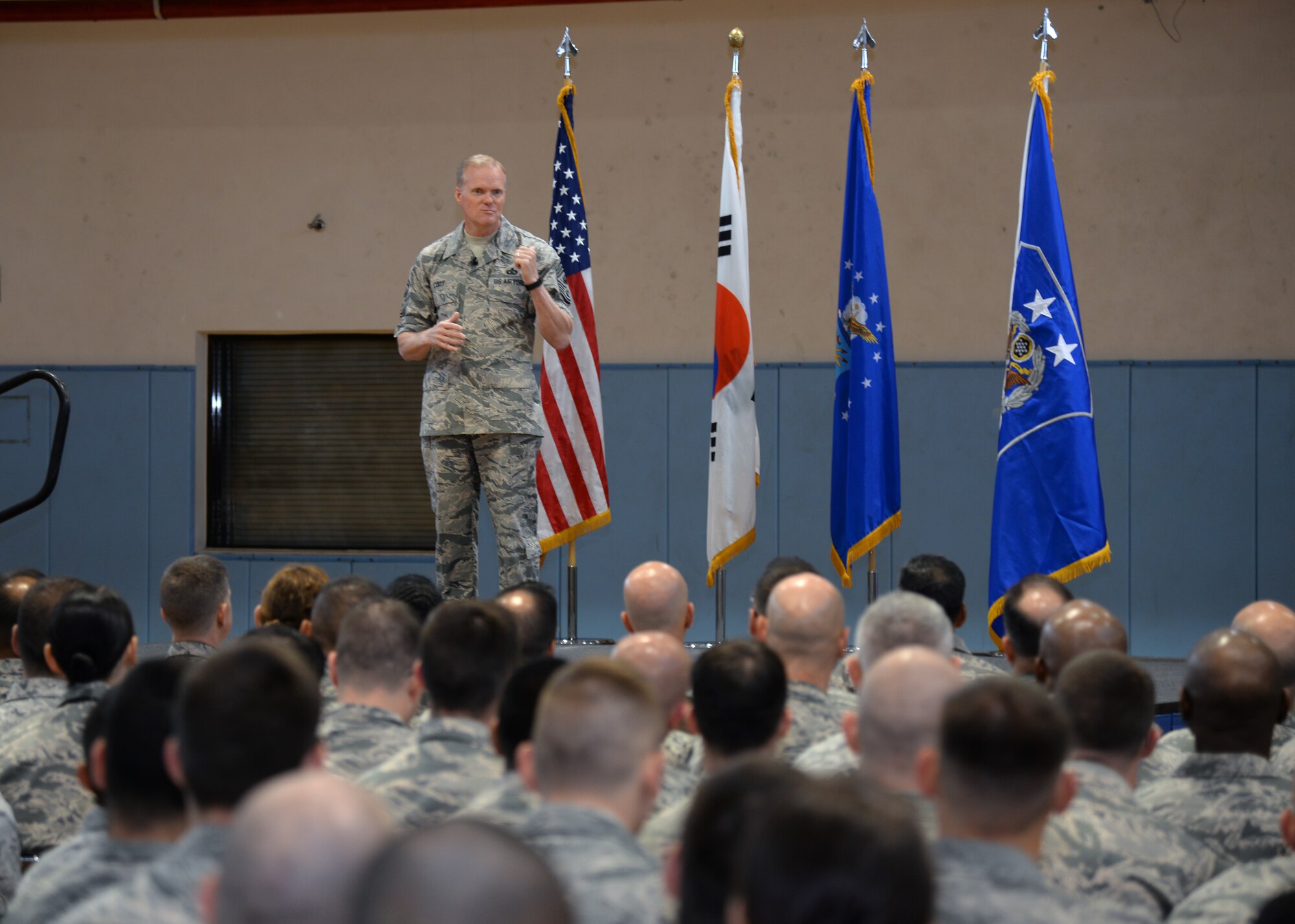 Chief Master Sgt. of the Air Force James Cody, speaks at an all call July 2, 2015, at Osan Air Base, Republic of Korea. Every time he met with Airmen, Cody discussed the Korean-American relationship and the global impact both nations play throughout the Pacific. (U.S. Air Force photo by Staff Sgt.
Benjamin Sutton/Released)
