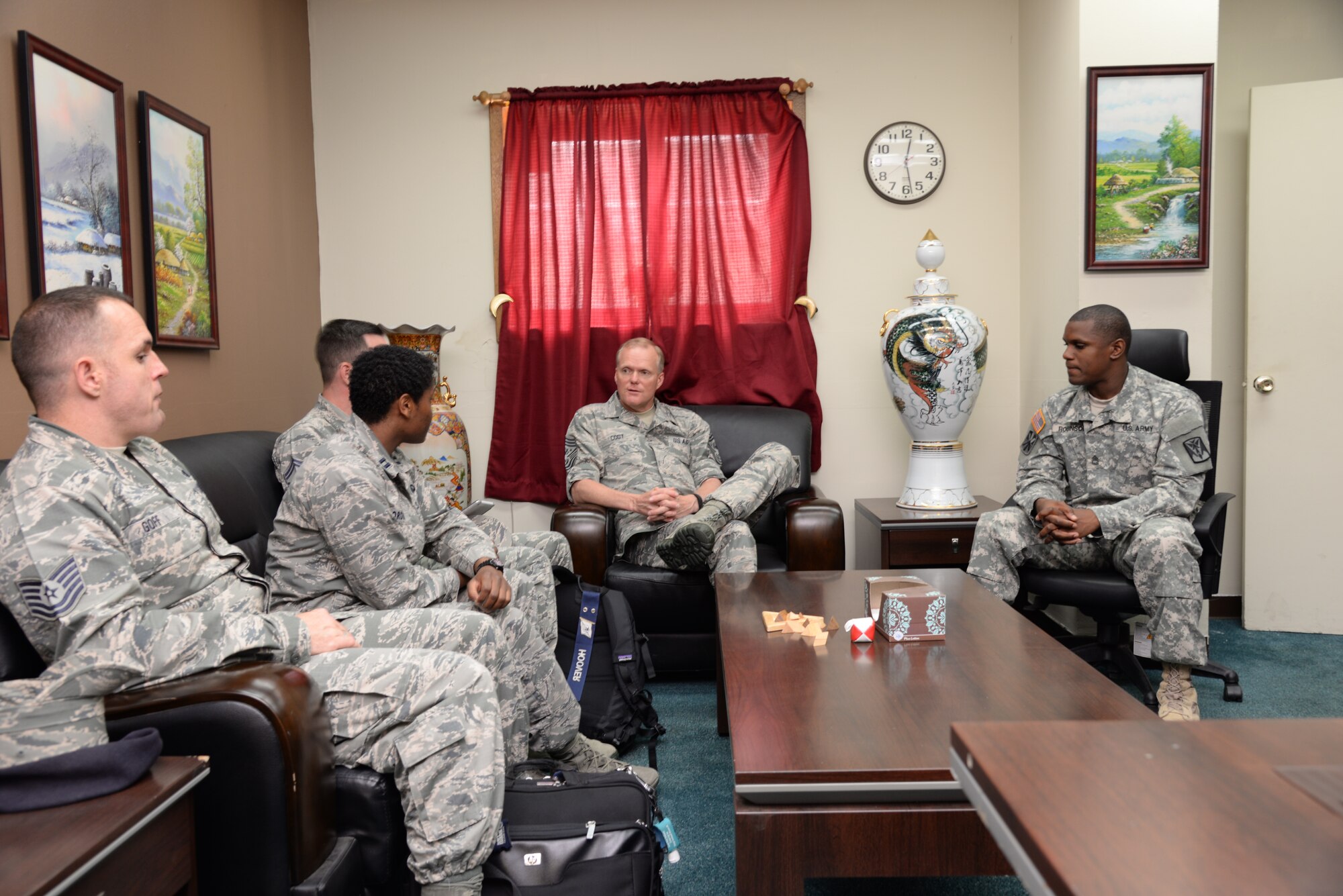Chief Master Sgt. of the Air Force James Cody, sits down for a discussion with members of the Sexual Assault Response Coordinator team, June 30, 2015, at Osan Air Base, Republic of Korea. As the Air Force's highest ranking enlisted Airman, Cody spoke about the need to educate Airmen on ways to promote a trusting and caring professional environment for all members. (U. S. Air Force photo by Staff Sgt. Benjamin Sutton/Released)
