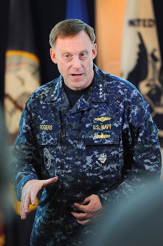 Navy Adm. Michael S. Rogers, commander of U.S. Cyber Command and National Security Agency director, responds to questions during an interview with personnel from Defense Media Activity in Suffolk, Va., June 11, 2015. 
