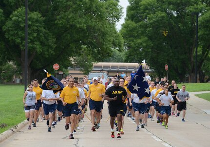 U.S. Navy Adm. Cecil D. Haney (center left), U.S. Strategic Command commander, U.S. Army Command Sgt. Maj. Patrick Z. Alston (center right), USSTRATCOM senior enlisted leader, and members of USSTRATCOM participate in a command fun run at Offutt Air Force Base, Neb., July 2, 2015. The four-plus mile formation run was led by the command's senior leaders to promote the importance of teamwork and physical fitness. USSTRATCOM is one of nine DoD unified combatant commands and is charged with strategic deterrence; space operations; cyberspace operations; joint electronic warfare; global strike; missile defense; intelligence, surveillance and reconnaissance; combating weapons of mass destruction; and analysis and targeting. (USSTRATCOM photo by U.S. Air Force Staff Sgt. Jonathan Lovelady)