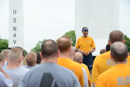 U.S. Navy Adm. Cecil D. Haney, U.S. Strategic Command commander, thanks command members for their participation after a fun run at Offutt Air Force Base, Neb., July 2, 2015. The four-plus mile formation run was led by the command's senior leaders to promote the importance of teamwork and physical fitness. USSTRATCOM is one of nine DoD unified combatant commands and is charged with strategic deterrence; space operations; cyberspace operations; joint electronic warfare; global strike; missile defense; intelligence, surveillance and reconnaissance; combating weapons of mass destruction; and analysis and targeting. (USSTRATCOM photo by U.S. Air Force Staff Sgt. Jonathan Lovelady)