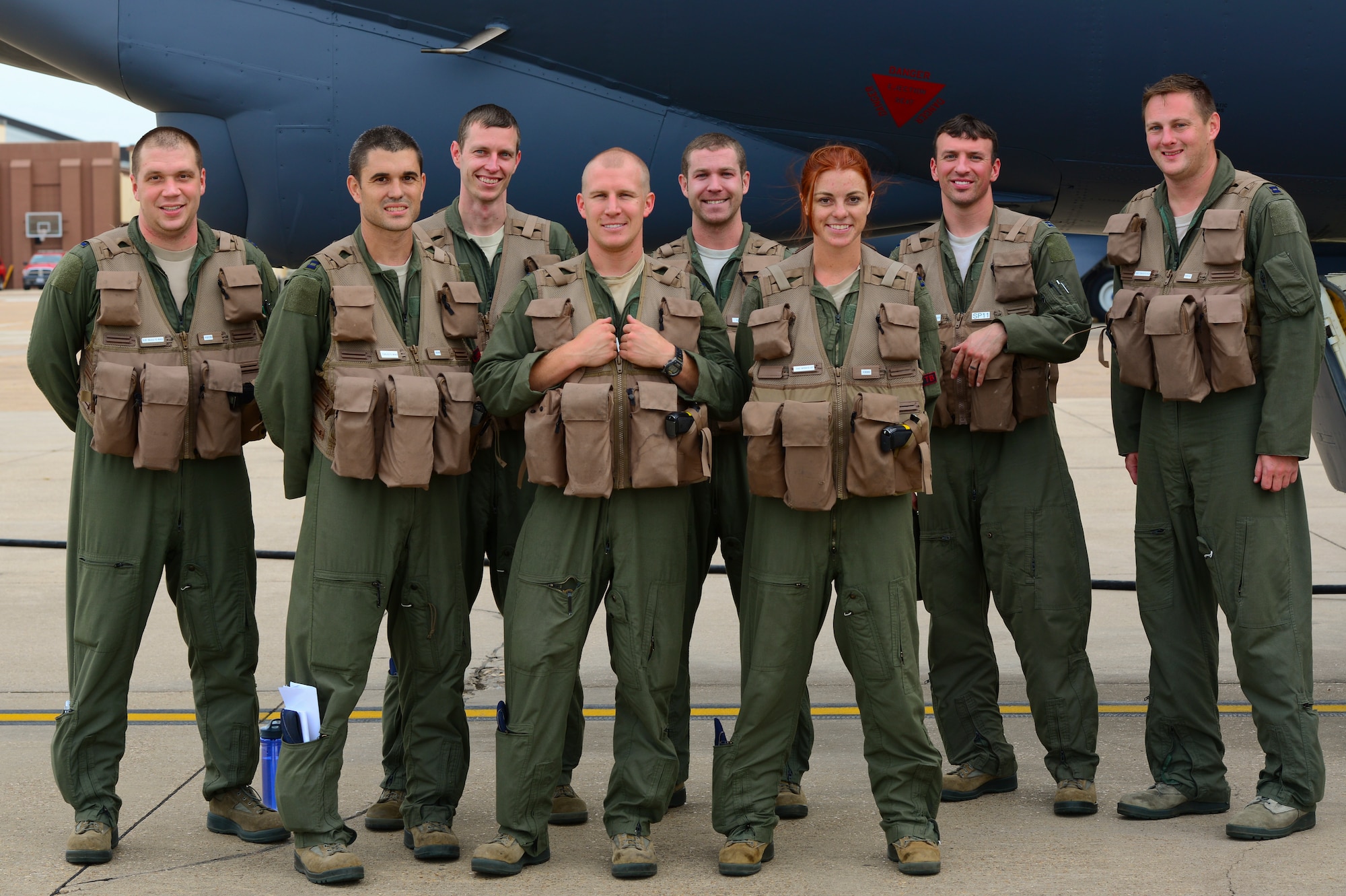 A 96th Bomb Squadron B-52H aircrew poses for a photo at Barksdale Air Force Base, La., following a 44-hour nonstop sortie July 2, 2015. Two B-52H Stratofortress bombers and aircrews from the 96 BS flew a round-trip mission from Barksdale to Australia, demonstrating the United States’ ability to project a flexible, long-range global strike capability. During the mission, aircrews integrated with Royal Australian Air Force ground forces in the region, conducted an inert conventional weapons exercise on the Delamere Air Weapons Range, and performed a low approach at RAAF Base Tindal. U.S. Strategic Command, through its global strike assets, regularly conducts training with and in support of the geographic combatant commands to help maintain global stability and security, while enabling units to become familiar with operating in different regions of the world. (U.S. Air Force photo/Senior Airman Benjamin Raughton)
