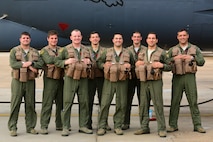 A 96th Bomb Squadron B-52H aircrew poses for a photo at Barksdale Air Force Base, La., following a 44-hour nonstop sortie July 2, 2015. Two B-52H Stratofortress bombers and aircrews from the 96 BS flew a round-trip mission from Barksdale to Australia, demonstrating the United States’ ability to project a flexible, long-range global strike capability. During the mission, aircrews integrated with Royal Australian Air Force ground forces in the region, conducted an inert conventional weapons exercise on the Delamere Air Weapons Range, and performed a low approach at RAAF Base Tindal. U.S. Strategic Command, through its global strike assets, regularly conducts training with and in support of the geographic combatant commands to help maintain global stability and security, while enabling units to become familiar with operating in different regions of the world. (U.S. Air Force photo/Senior Airman Benjamin Raughton)