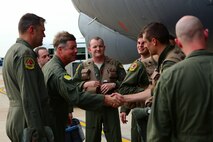 Col. Keith Schultz, 2nd Bomb Wing vice commander, welcomes B-52H Stratofortress aircrew members home to Barksdale Air Force Base, La., following a round-trip mission to Australia July 2, 2015. The 44-hour nonstop mission, which was closely coordinated with the Australian Department of Defence, provided unique opportunities to synchronize strategic activities and capabilities with a key ally in the U.S. Pacific Command area of operations. (U.S. Air Force photo/Senior Airman Benjamin Raughton)