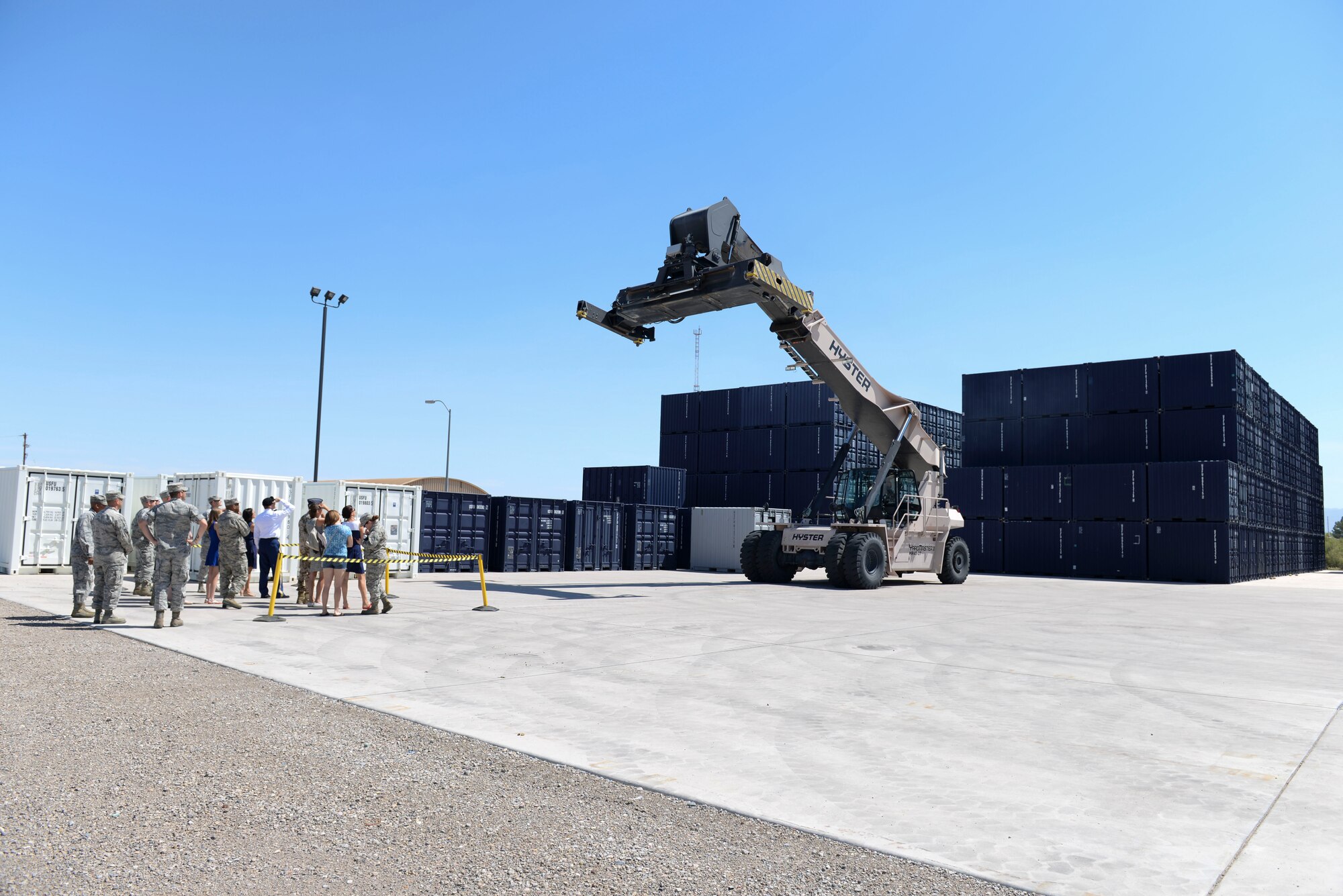 Distinguished Visitors observe the capabilities of a Hyster Reachstacker during a tour here at Holloman’s Air Force Base Basic Expeditionary Airfield Resources (BEAR) Base July 1, 2015. The tour was held to showcase the 49th Materiel Maintenance Group’s flexible and responsive expeditionary airfield resources and expertise that support the nation’s priorities overseas. (U.S. Air Force photo by Staff Sgt. E’Lysia A. Wray/Released)