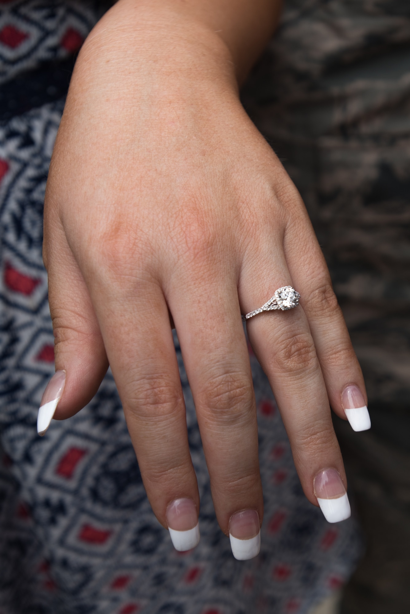 Vanna Jones models her engagement ring after Tech. Sgt. Mike Johnson, a C-130 crew chief in the 123rd Airlift Wing, proposed to her on the flight line of the Kentucky Air National Guard Base in Louisville, Ky., July 4, 2015. Johnson had just returned from a deployment to the Persian Gulf region, where more than 100 members of the Kentucky Air Guard have been supporting Operation Freedom's Sentinel since February. (U.S. Air National Guard photo by Maj. Dale Greer)