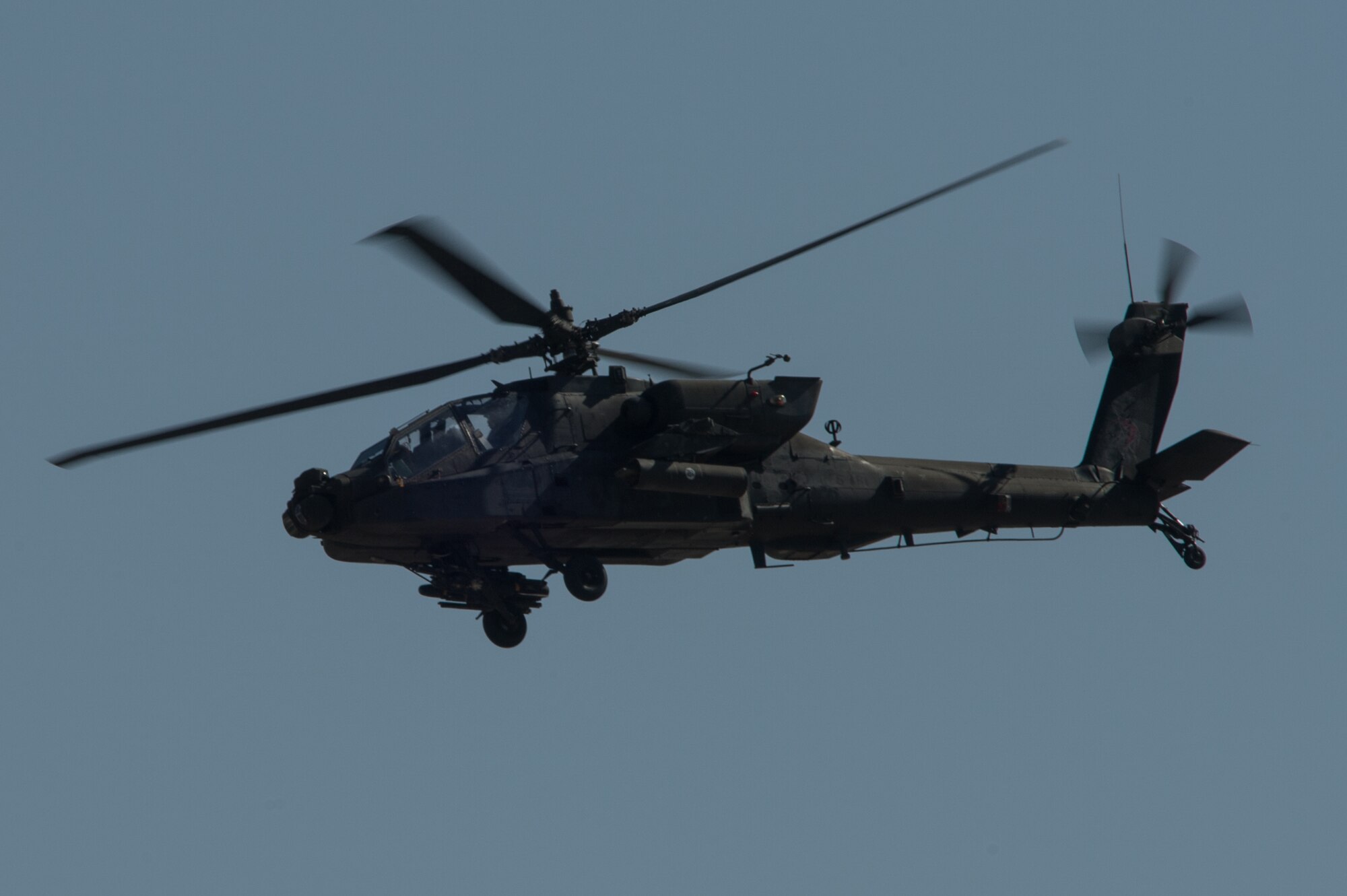 A U.S. Army AH-64 Apache helicopter flies near Bagram Airfield, Afghanistan, July 4, 2015. (U.S. Air Force photo by Tech. Sgt. Joseph Swafford/Released)