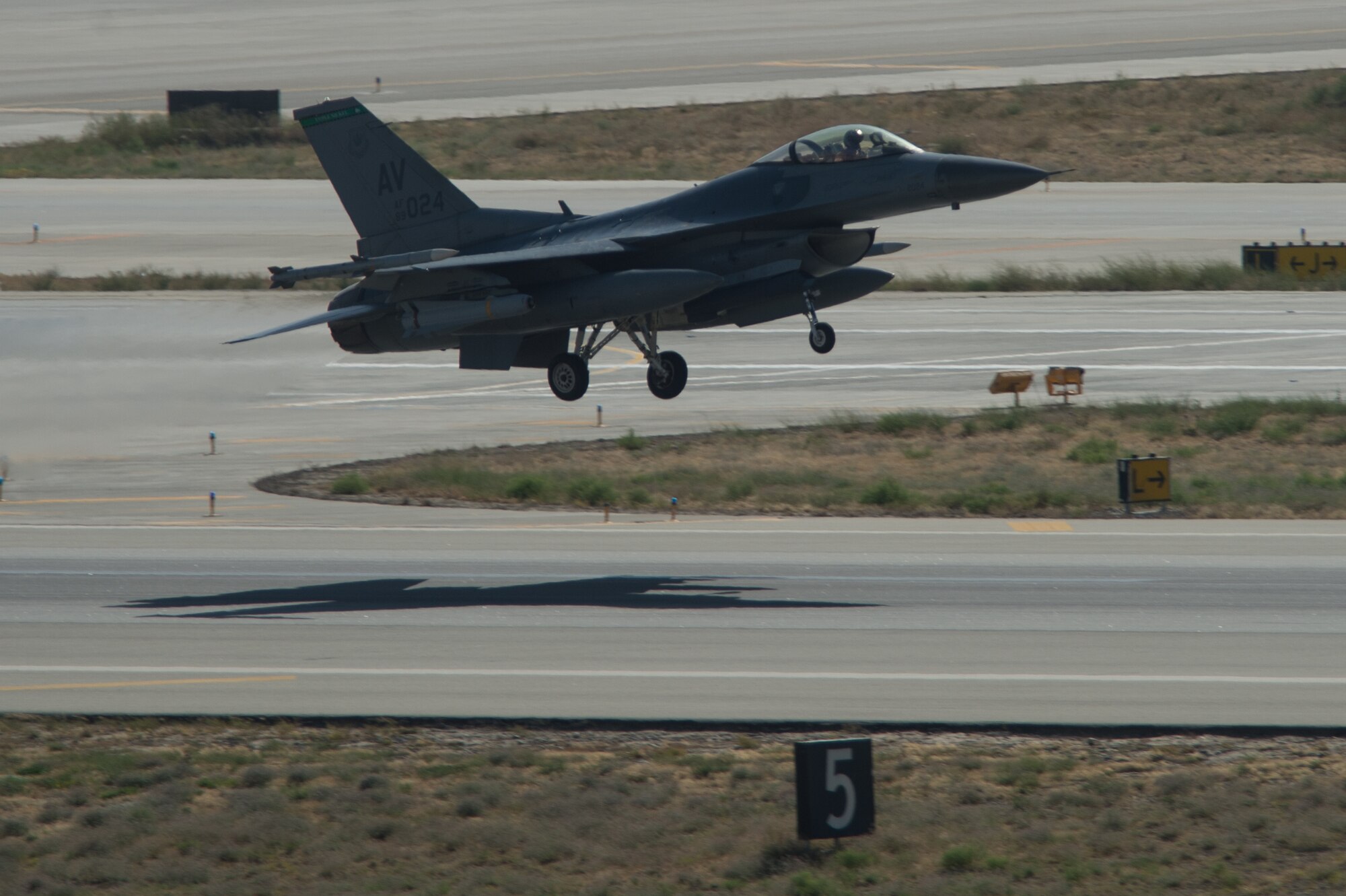 A U.S. Air Force F-16 Fighting Falcon “Triple Nickel” aircraft assigned to the 555th Expeditionary Fighter Squadron from Aviano Air Base, Italy, takes off from Bagram Airfield, Afghanistan, July 4, 2015. The F-16 is a multi-role fighter aircraft that is highly maneuverable and has proven itself in air-to-air and air-to-ground combat. Members of the Triple Nickel are deployed in support of Operation Freedom’s Sentinel and NATO’s Resolute Support mission. (U.S. Air Force photo by Tech. Sgt. Joseph Swafford/Released)