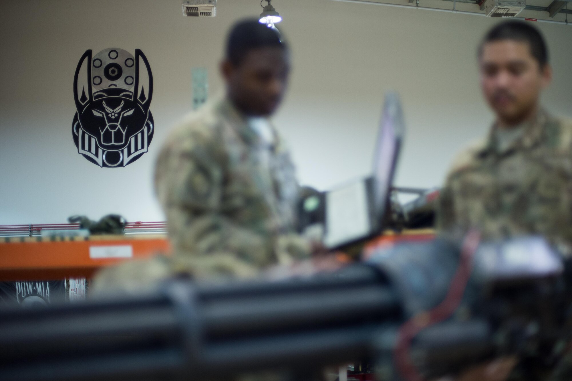 U.S. Airmen assigned to the 455th Expeditionary Maintenance Squadron Armament Flight perform an inspection on an F-16 Fighting Falcon 20mm Gatlin gun at Bagram Airfield, Afghanistan, July 5, 2015. The Gatling gun system is a fixed-forward firing system that provides maximum lethality against air-to-air and air-to-surface targets. (U.S. Air Force photo by Tech. Sgt. Joseph Swafford/Released)