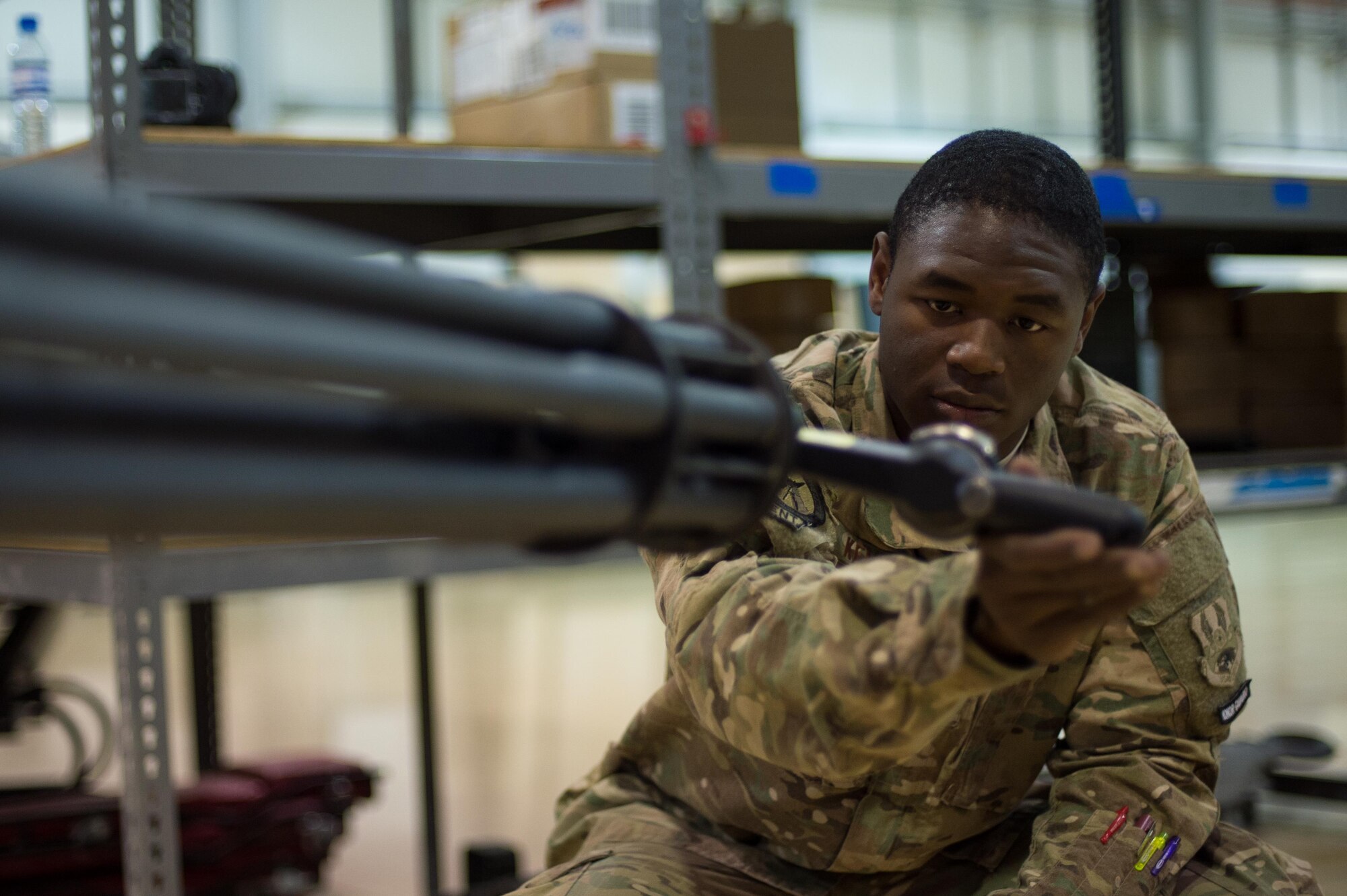 U.S. Air Force Airman 1st Class Avary Kemp, 455th Expeditionary Maintenance Squadron Armament Flight, performs an inspection on an F-16 Fighting Falcon 20mm Gatlin gun at Bagram Airfield, Afghanistan, July 5, 2015. The Gatling gun system is a fixed-forward firing system that provides maximum lethality against air-to-air and air-to-surface targets. (U.S. Air Force photo by Tech. Sgt. Joseph Swafford/Released)