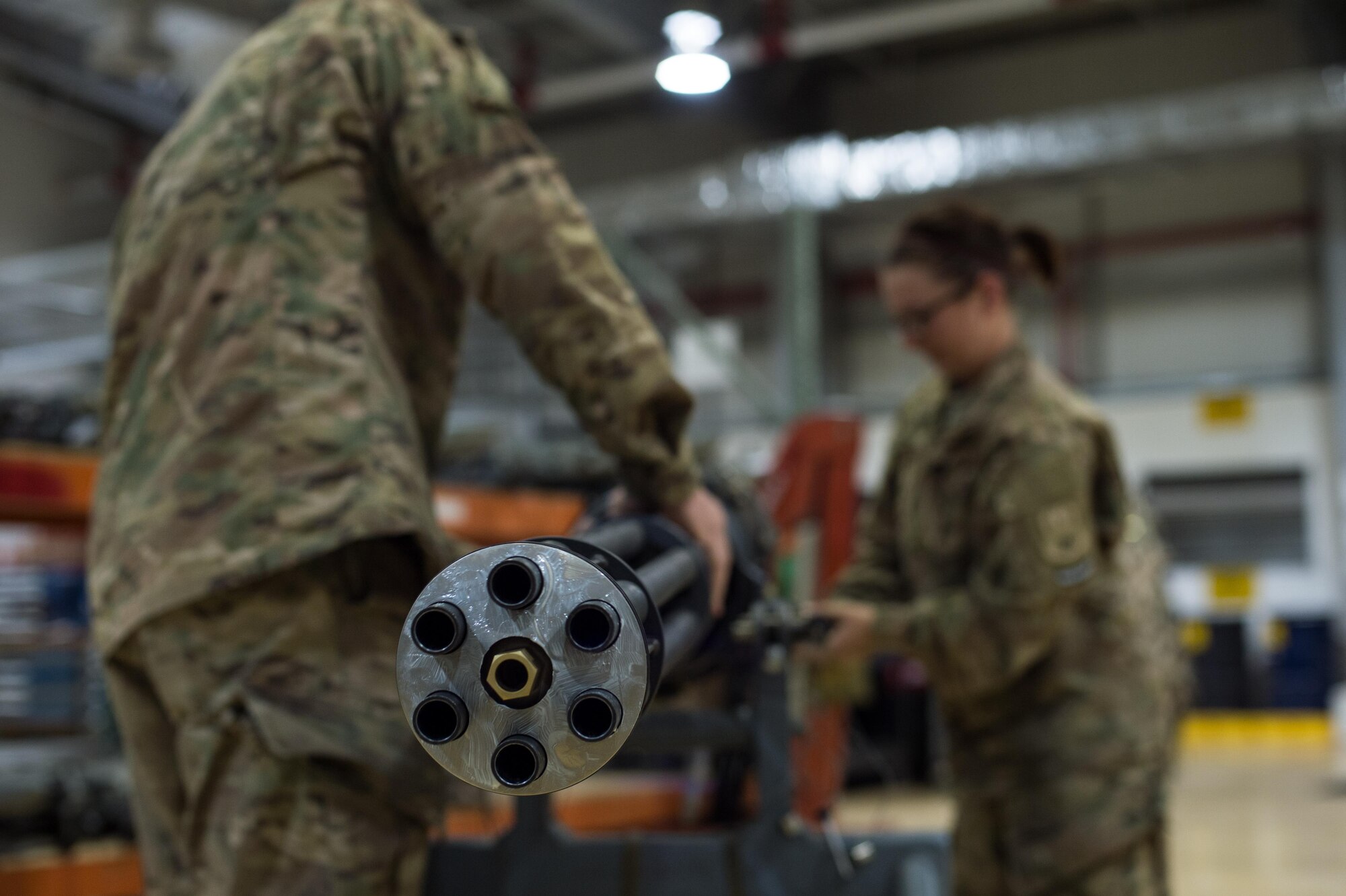 U.S. Airmen assigned to the 455th Expeditionary Maintenance Squadron Armament Flight perform an inspection on an F-16 Fighting Falcon 20mm Gatlin gun at Bagram Airfield, Afghanistan, July 5, 2015. The Gatling gun system is a fixed-forward firing system that provides maximum lethality against air-to-air and air-to-surface targets. (U.S. Air Force photo by Tech. Sgt. Joseph Swafford/Released)