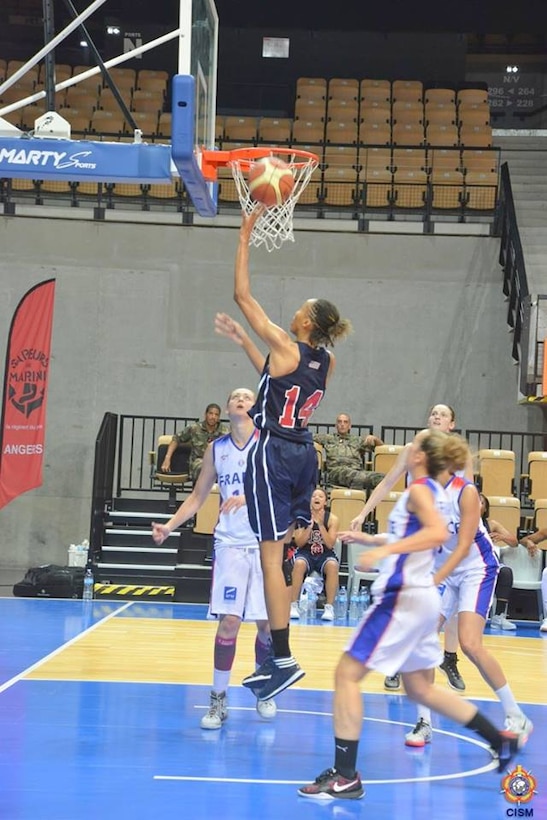 Army Spc. Danielle Salley lays up during the bronze medal game against France.  USA defeats France 78-41 during the 1st Conseil International du Sport Militaire (CISM) World Women's Basketball Championship in Angers, France June 28 to July 5.  
