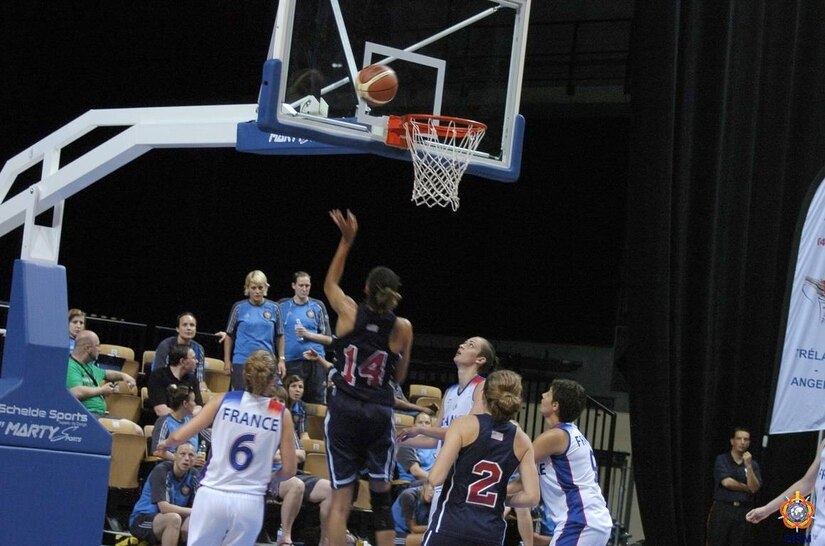 Army Spc. Danielle Sally lays up against France during the bronze medal game against France.  USA defeats France 78-41 during the 1st Conseil International du Sport Militaire (CISM) World Women's Basketball Championship in Angers, France June 28 to July 5.  