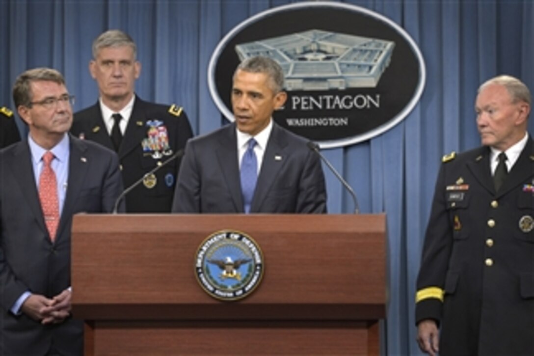 President Barack Obama addresses reporters at the Pentagon, July 6, 2015, after meeting with Defense Secretary Ash Carter, left. Army Gen. Martin E. Dempsey, chairman of the joint Chiefs of Staff, stands at right. 