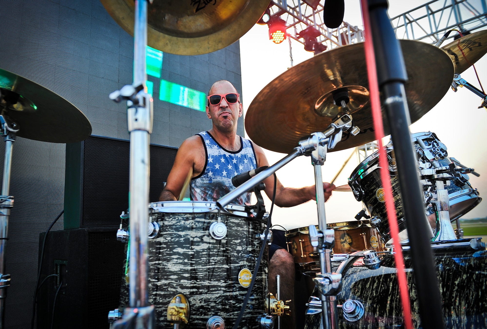 Mike Cosgrove, Alien Ant Farm drummer, smirks at the photographer during a song at the Liberty Fest concert July 4, 2015 at Osan Air Base, Republic of Korea. Alien Ant Farm was at Osan AB in part of the Liberty Fest entertainment, in celebration of Independence Day. (U.S. Air Force photo/Tech. Sgt. Travis Edwards)
