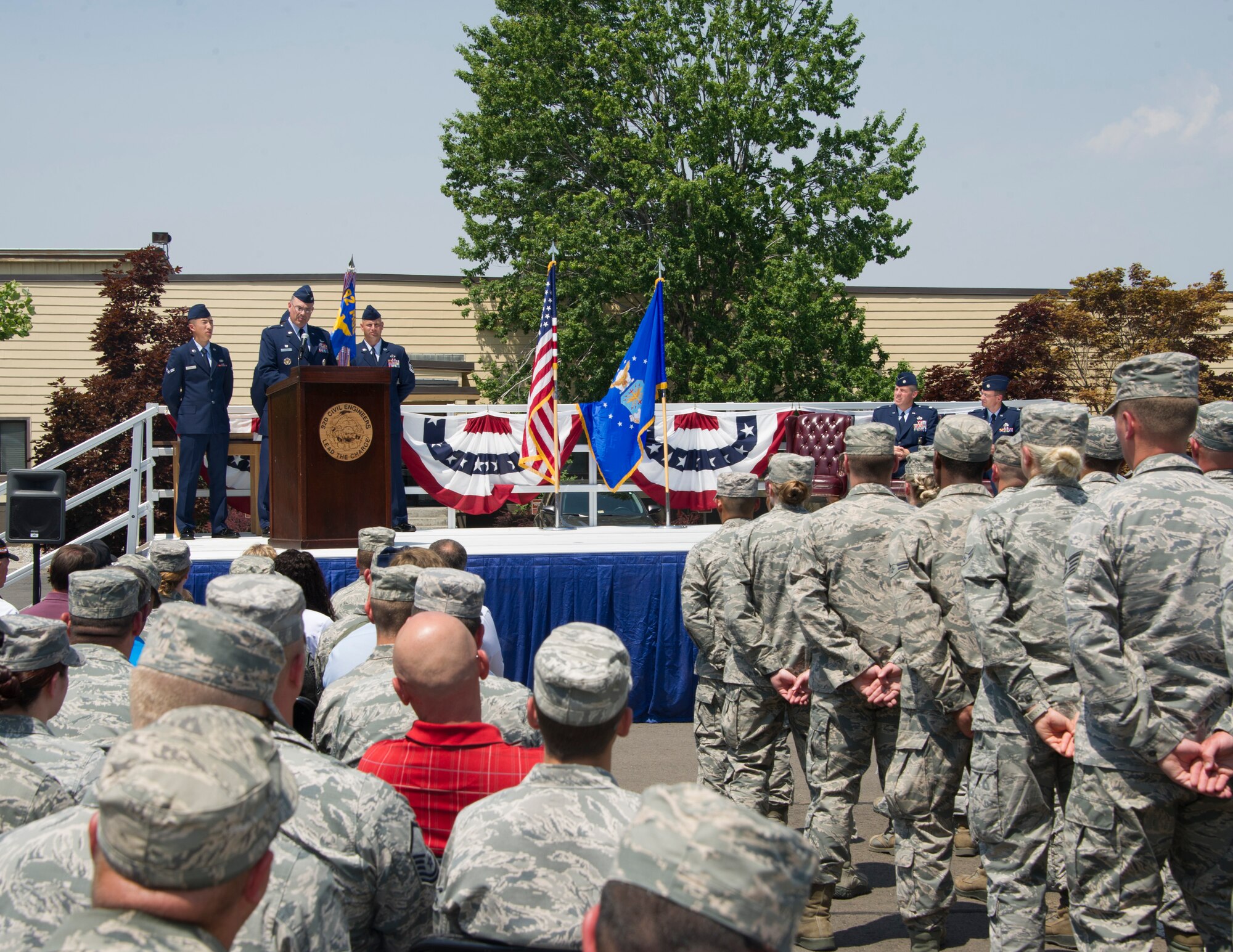 Col. David Stookey, 92nd Mission Support Group commander, address Airmen and thanks them for their hard work and dedication during the 92nd Civil Engineer Squadron change of command July 6, 2015, at Fairchild Air Force Base, Wash. The change of command ceremony is an official, formal and brief ceremony that is the military's way of bestowing command responsibility of a unit from one officer to another. (U.S. Air Force photo/Airman 1st Class Nicolo J. Daniello)
