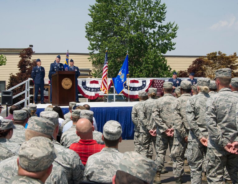 Col. David Stookey, 92nd Mission Support Group commander, address Airmen and thanks them for their hard work and dedication during the 92nd Civil Engineer Squadron change of command July 6, 2015, at Fairchild Air Force Base, Wash. The change of command ceremony is an official, formal and brief ceremony that is the military's way of bestowing command responsibility of a unit from one officer to another. (U.S. Air Force photo/Airman 1st Class Nicolo J. Daniello)
