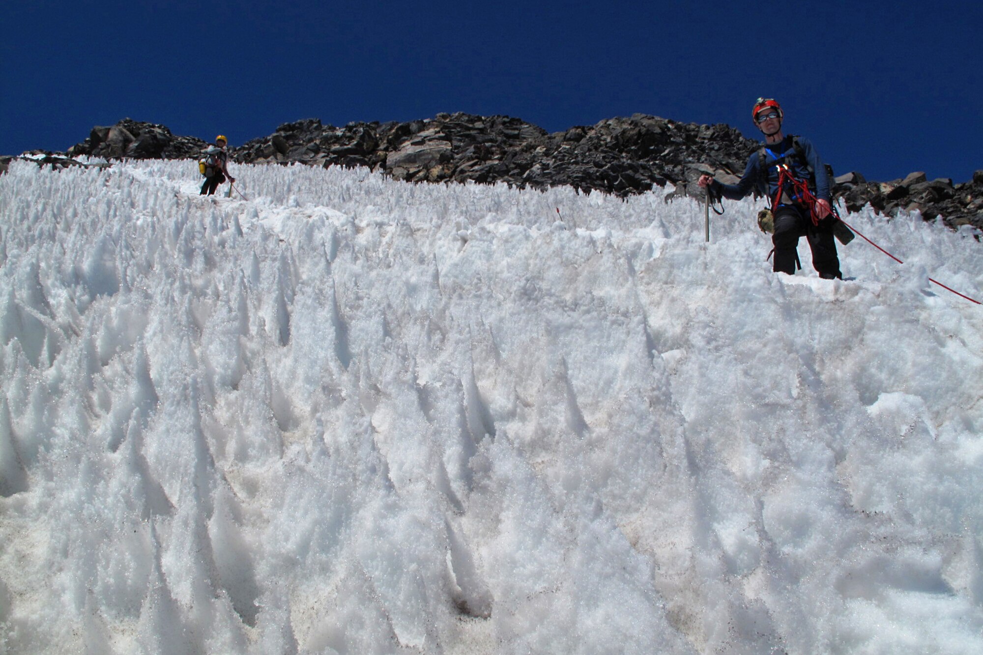 Maj. Clinton Varty (right), 62nd Maintenance Squadron commander, and Alex Rising, alpine climber, descend Mount Rainer, Wash., June 22, 2013. Mount Rainier was Varty’s first mountain he climbed as a newcomer to the world of alpine climbing. (Courtesy photo)