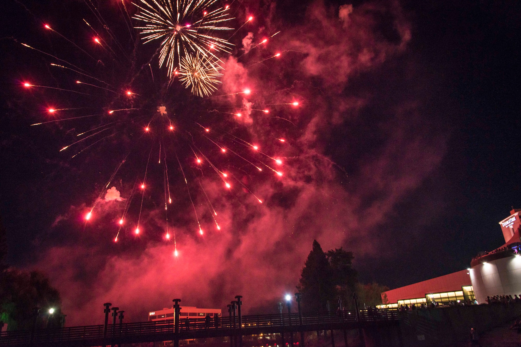 Fireworks burst over head during Fourth of July celebrations at Riverfront Park July 4, 2015, in Spokane, Wash. Fairchild base leadership provided a patriotic message while the honor guard presented the colors in front of nearly 5,000 community members during the opening ceremonies of the Spokane, Washington, July Fourth celebrations in Riverfront Park. (U.S. Air Force photo/Staff Sgt. Benjamin W. Stratton)
