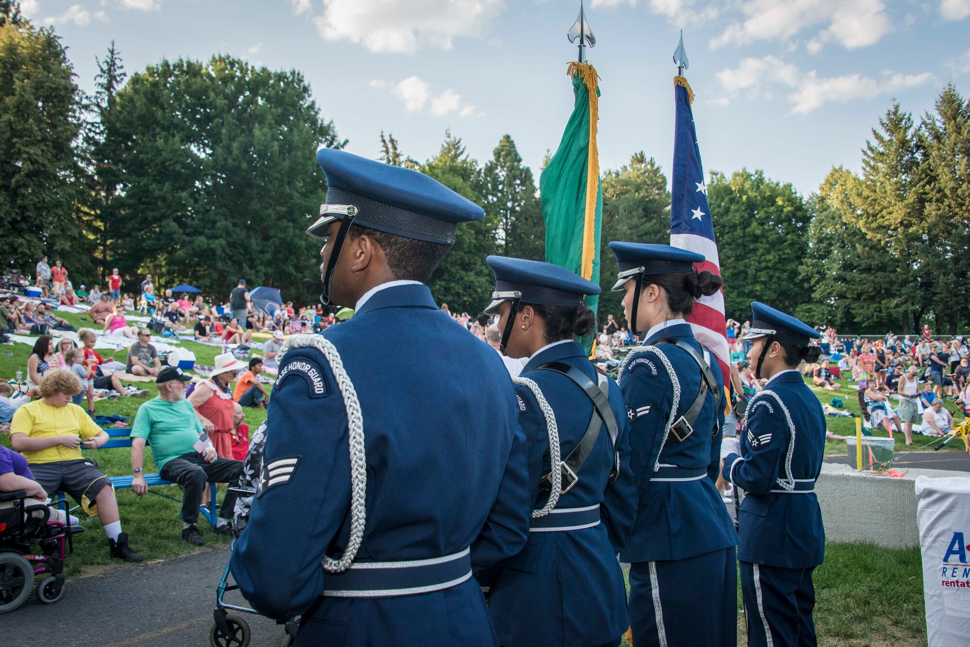 The Fairchild Honor Guard stands ready to present the colors during Fourth of July celebrations at Riverfront Park July 4, 2015, in Spokane, Wash. The honor guard provides military honors at various events across their area of responsibility in Washington, Idaho and Oregon. Honor guard members are handpicked and their standards of conduct and level of professionalism must be above reproach as they represent every member of the Air Force. (U.S. Air Force photo/Staff Sgt. Benjamin W. Stratton)
