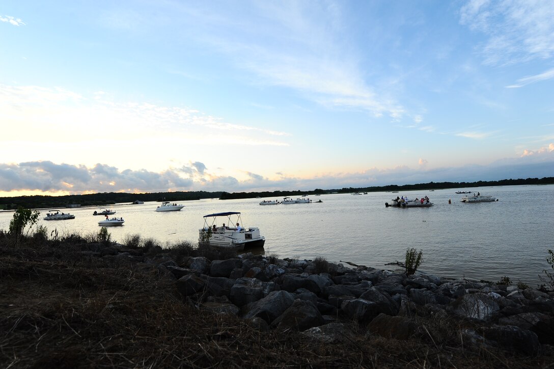 Boaters attend Fireworks on the Water July 4 on the water at the Stennis Lock and Dam. Attendees enjoyed live music from local artists Johnny Coleman and Swing Shift until the event closed with fireworks over the water. (U.S. Air Force photo/Airman 1st Class Daniel Lile)