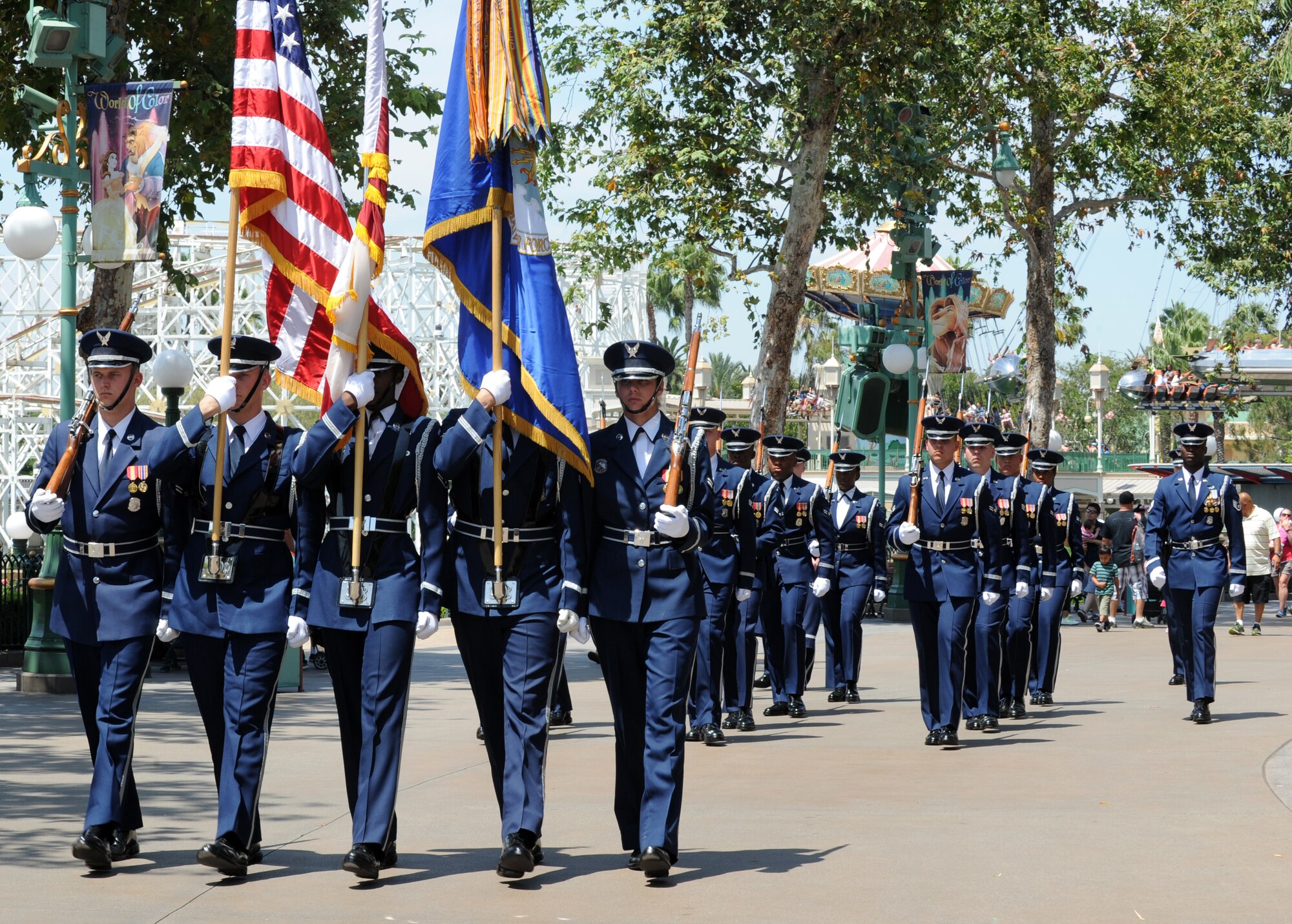 The United States Air Force Honor Guard participates in a parade at Disneyland in Anaheim, Calif., July 2, 2015. Forty-five guardsmen traveled to Disneyland to participate in the park's “Celebrate America,” Fourth of July performances. (U.S. Air Force photo/Staff Sgt. Nichelle Anderson)