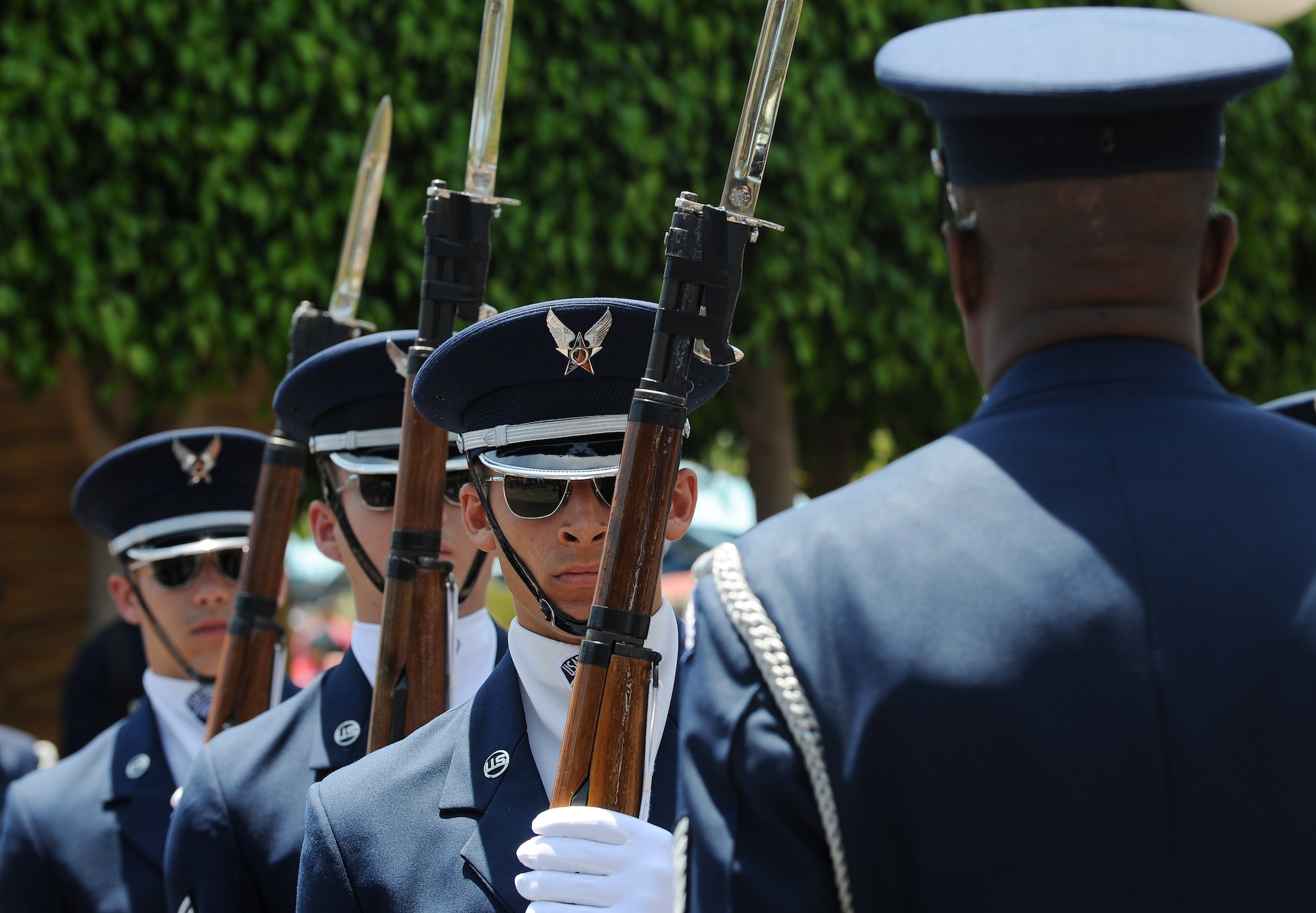 The Unites States Air Force Honor Guard drill team stands in formation during a drill performance at Disney's California Adventure in Anaheim, Calif., July 2, 2015. The HG is scheduled to perform six to seven times daily throughout the Fourth of July weekend. (U.S Air Force photo/Staff Sgt. Nichelle Anderson)