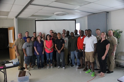 Captain Timothy Sparks, Joint Base Charleston deputy commander, along with Command Master Chief Joseph Gardner, MMCS Brett Baldwin, Sexual Assault Response coordinator, and Ruby Godley, Civilian Victim Advocate pose for a photo with with Navy sailors who completed the Sexual Assault Prevention & Response Victim Advocate Training June 25, 2015 at Joint Base Charleston. These newly trained service members will go on to obtain national certification through the Department of Defense – Sexual Assault Advocate Certification Program where they will then be able to respond to victims of sexual assault and provide support services and advocacy. (U.S. Navy photo / IT1 Jebediah Spencer)