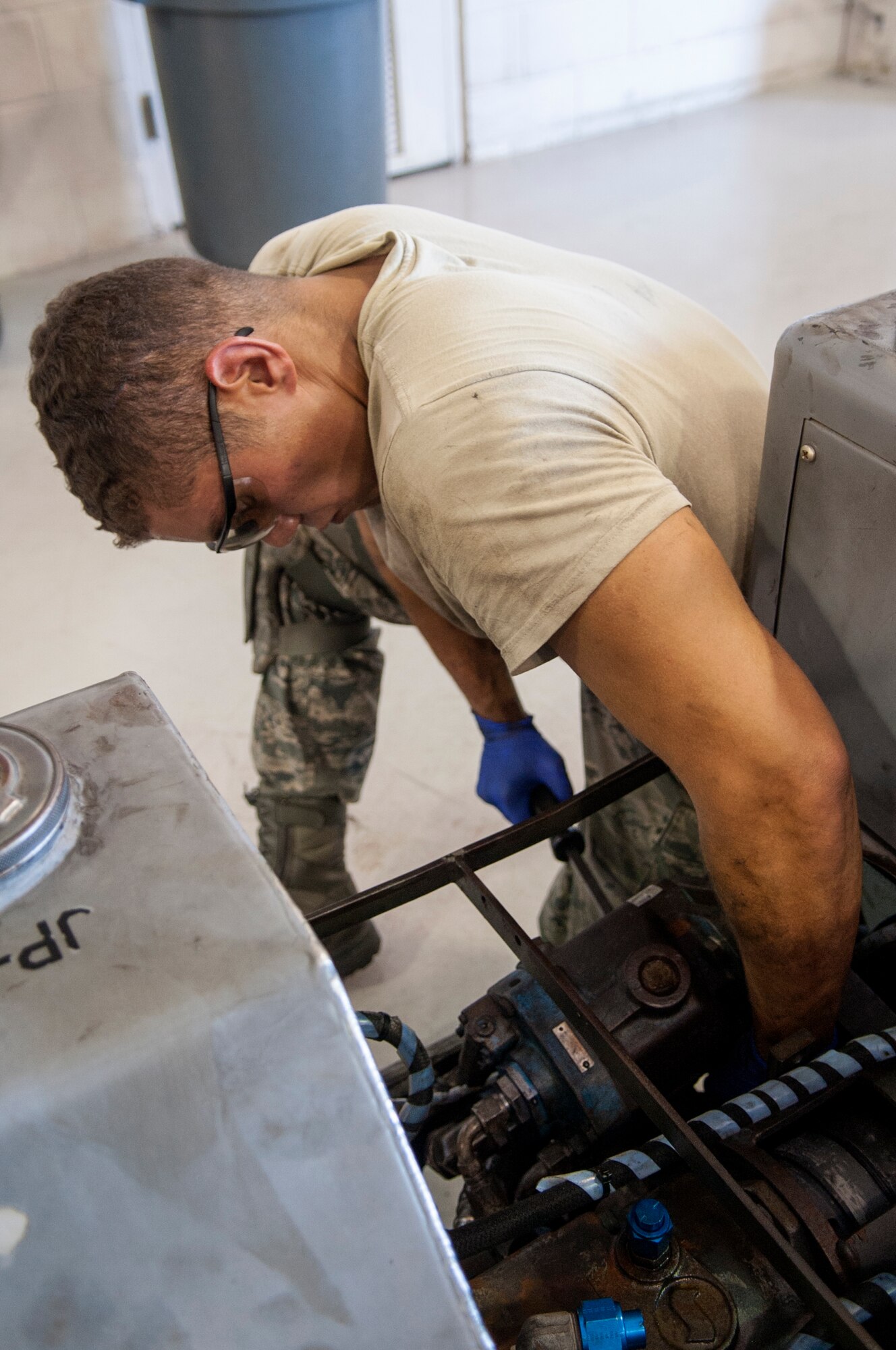 Senior Airman Jon Pesante, 4th Equipment Maintenance Squadron aerospace ground equipment technician, performs maintenance on a MJ1B bomb lift or “jammer”, June 22, 2015, at Seymour Johnson Air Force Base, North Carolina. The AGE flight conducts routine maintenance on more than 600 pieces of equipment used to support flying operations. (U.S. Air Force photo/Airman Shawna L. Keyes)