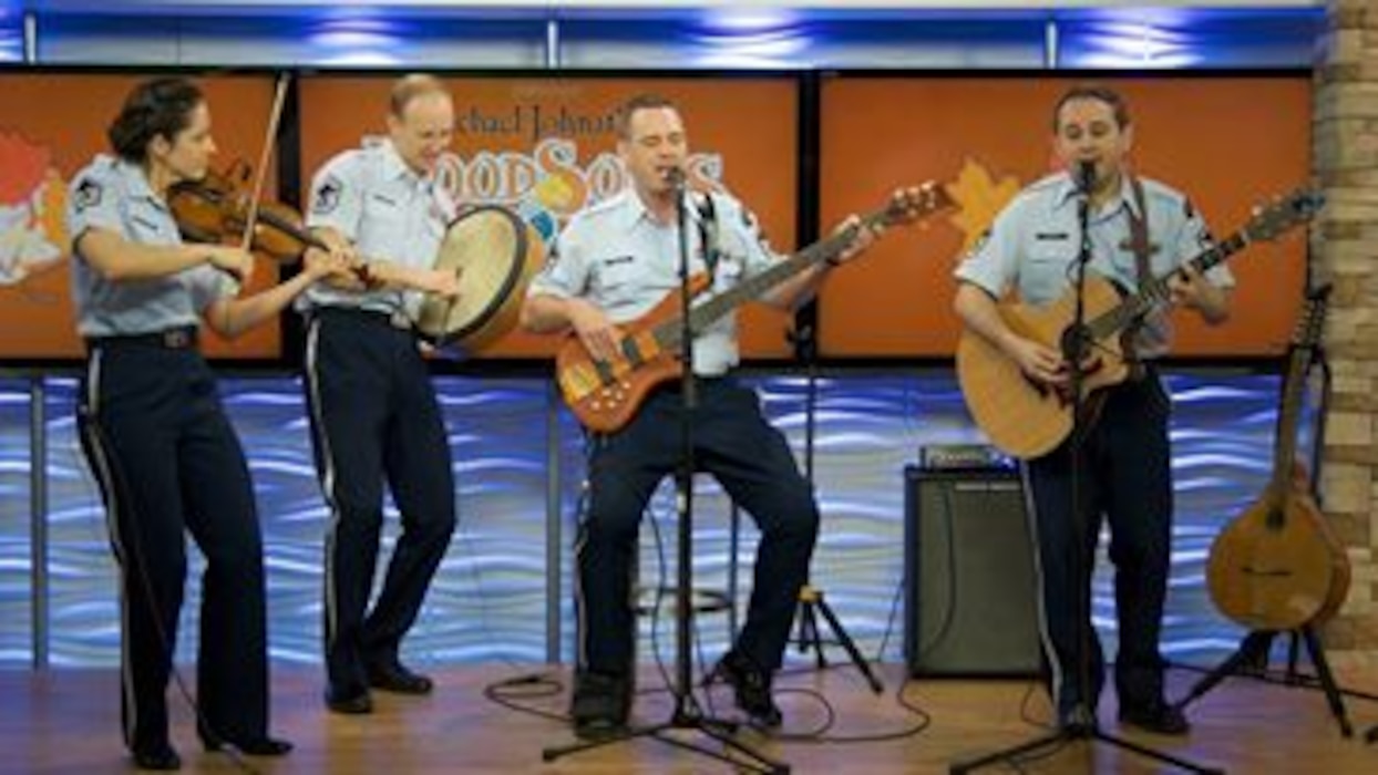 Celtic Aire performs on the WoodSongs Old-Time Radio Hour in Lexington, Kentucky. (U.S. Air Force Photo by Senior Master Sgt. Bob Kamholz/released)