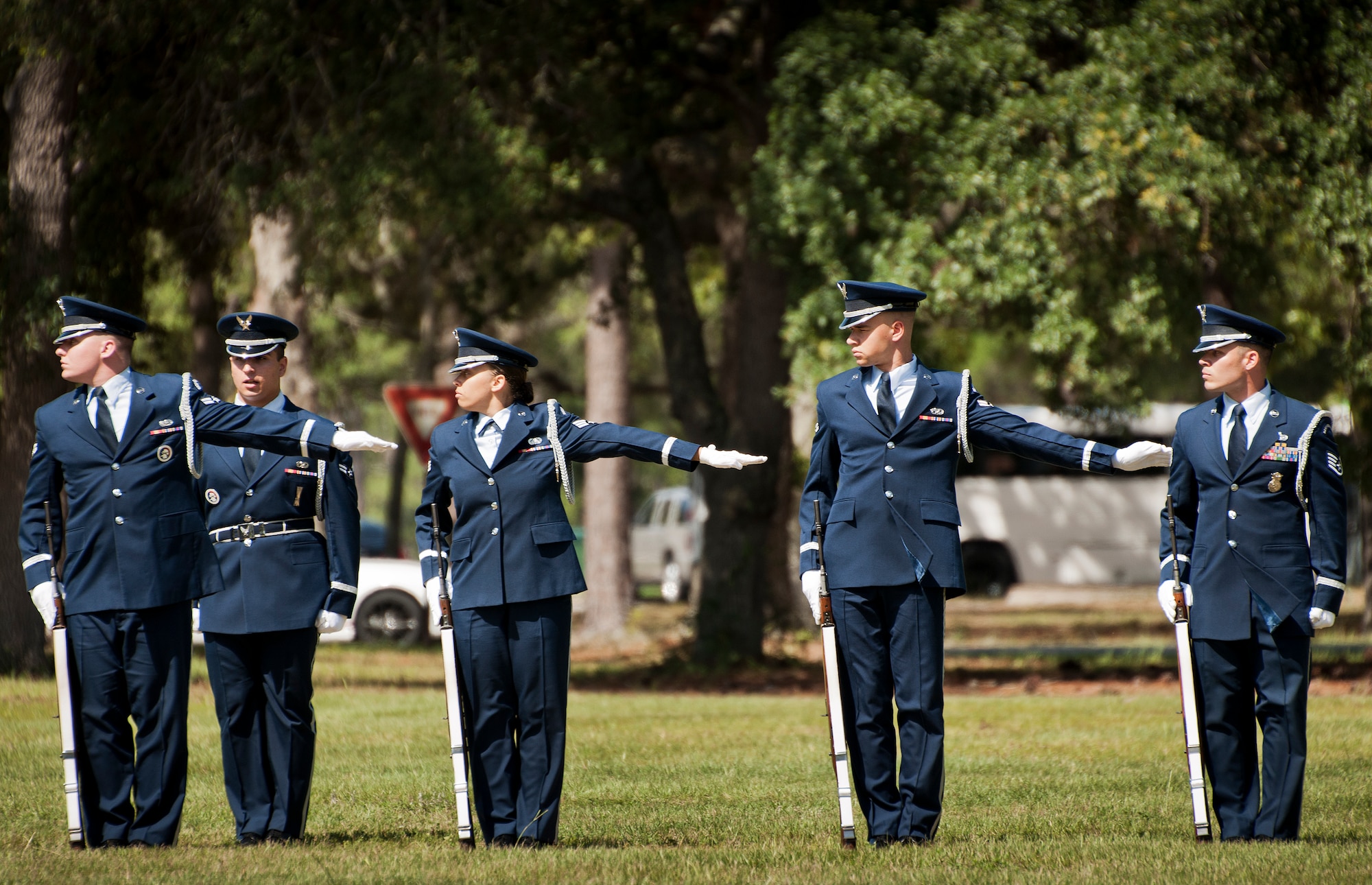 Members of the Eglin Air Force Base Honor Guard rifle team find their spacing during the unit’s graduation ceremony June 15. Approximately 12 new Airmen graduated from the 80-plus-hour course. The graduation performance includes flag detail, rifle volley, pall bearers and bugler for friends, family and unit commanders. (U.S. Air Force photo/Samuel King Jr.)