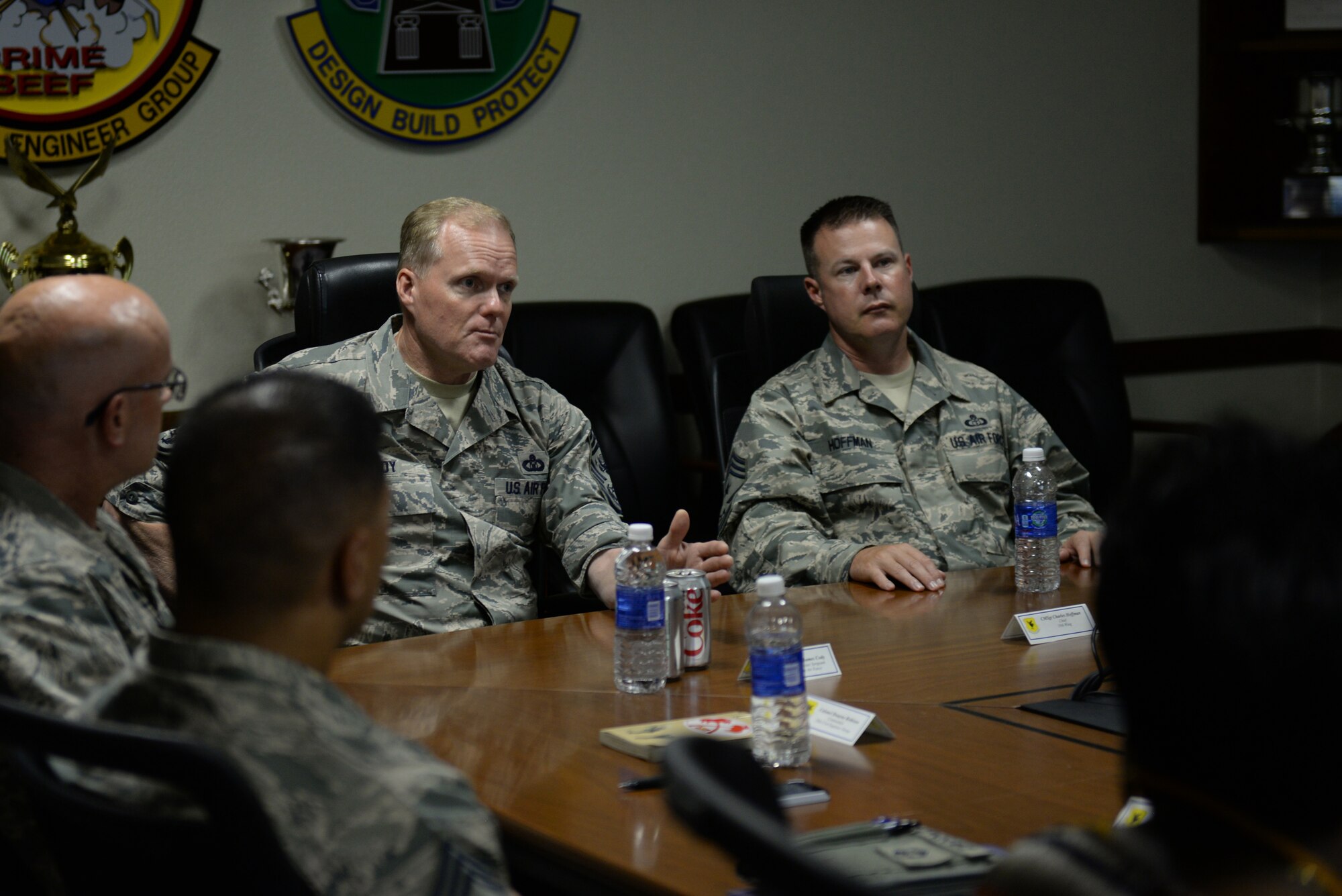 Chief Master Sgt. of the Air Force James Cody discusses quality of life issues and supporting infrastructure with Airmen from the 18th Civil Engineer Group on Kadena Air Base, Japan, July 6, 2015. During his visit, Cody answered Airmen’s questions regarding Air Force standards, new processes and entitlements. (U.S. Air Force photo by Senior Airman Omari Bernard)