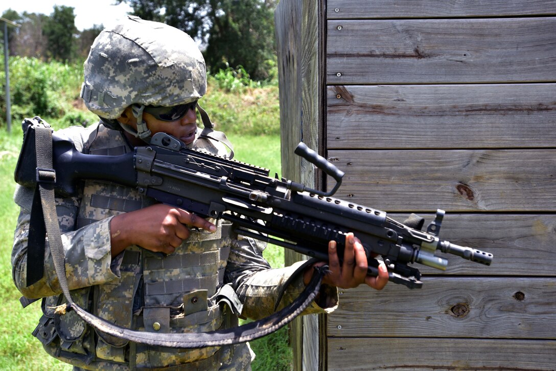 A Texas National Guard soldier provides security during pre-mobilization training on Camp Swift in Bastrop, Texas, June 29, 2015. 