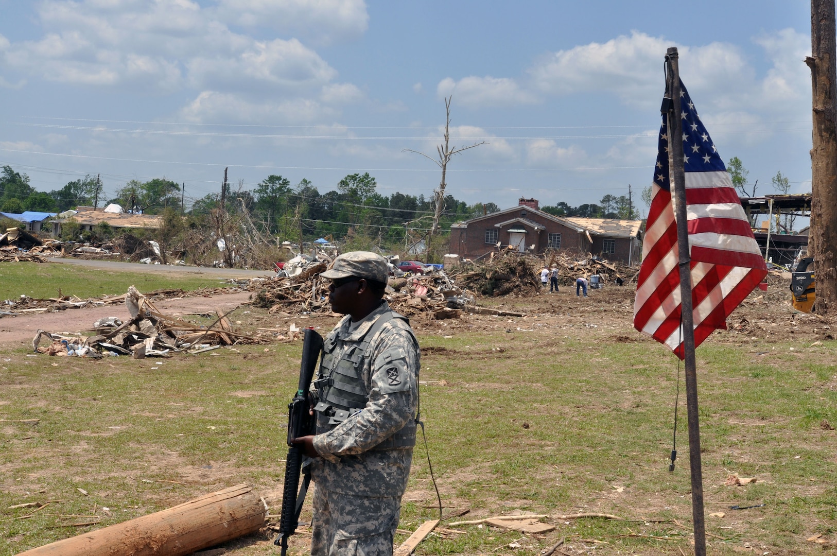 Army Pfc. Justin Jackson, of the Alabama Army National Guard's 1670th Transportation Company, provides flood response security for residents of Concord, Ala., May 9, 2011. Jackson is one of nearly 2,000 Guard members assisting with security, logistics, aviation and other support missions throughout Alabama’s affected regions.