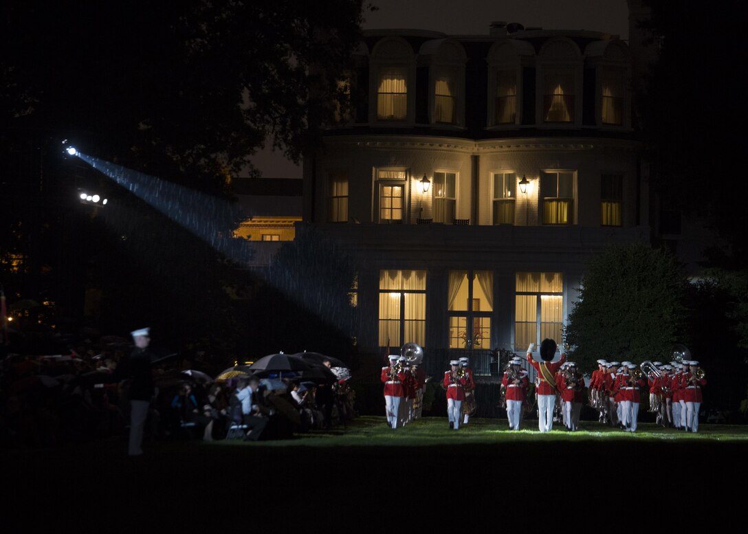 The U.S. Marine Band performs during a Friday Evening Parade at Marine Barracks Washington, D.C., July 3, 2015. The Honorable, Dr. Jack Dyer Crouch II, CEO and president of the USO, was the guest of honor and Lt. Gen. Mark Brilakis, commanding general Marine Corps Recruiting Command, was the hosting official for that same parade. (Official Marine Corps photo by Cpl. Chi Nguyen/Released)